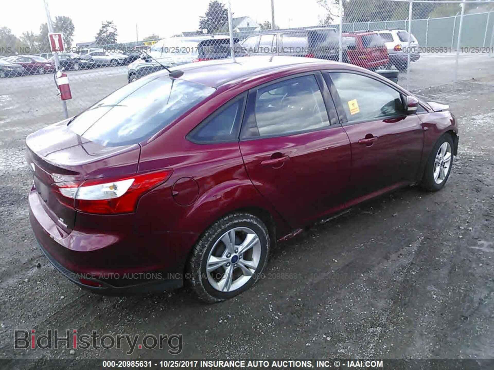 2014 Ford Focus - VIN: 1FADP3F20EL245707 - Photo 4