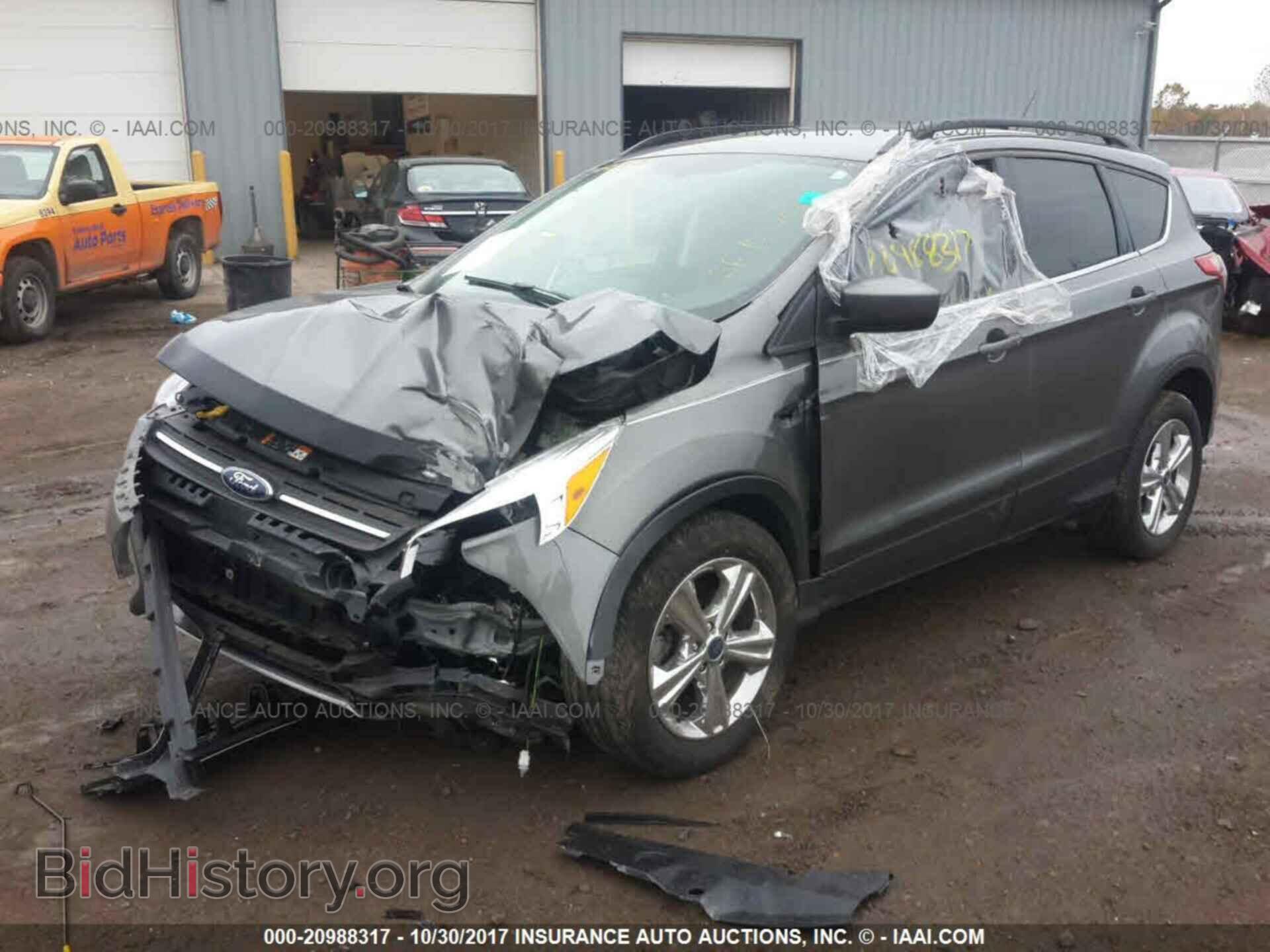 2014 Ford Escape - VIN: 1FMCU0GX1EUC83024 - Photo 2