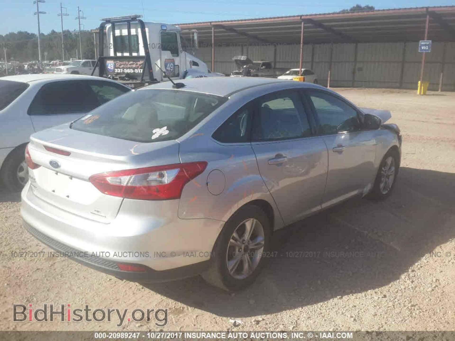2014 Ford Focus - VIN: 1FADP3F2XEL103834 - Фото 4