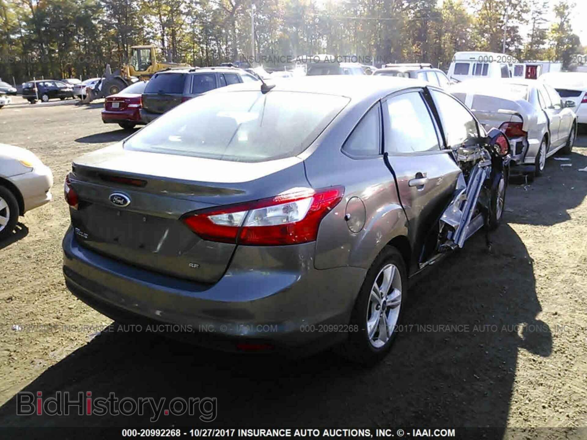 2013 Ford Focus - VIN: 1FADP3F24DL331729 - Photo 4