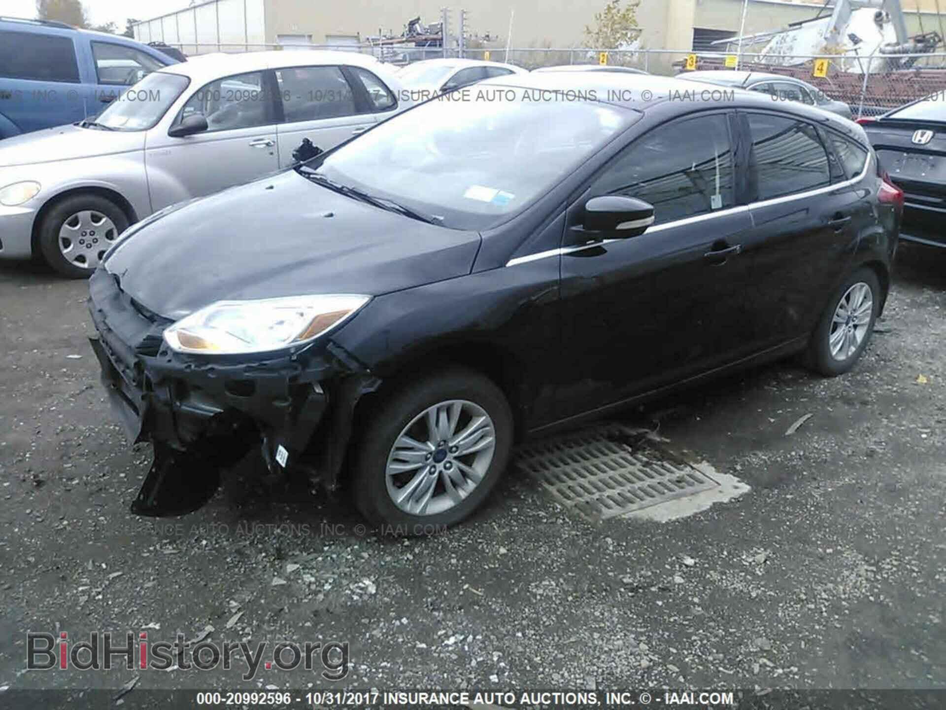 2012 Ford Focus - VIN: 1FAHP3M27CL306875 - Photo 2