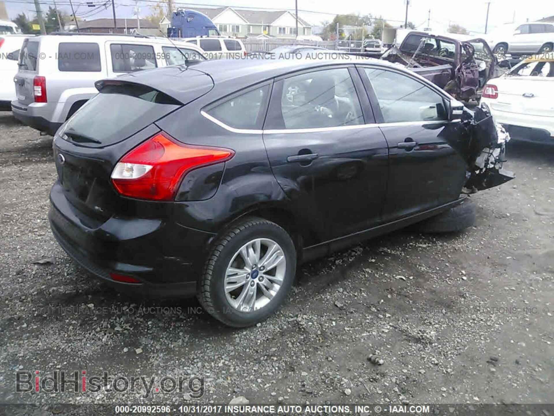 2012 Ford Focus - VIN: 1FAHP3M27CL306875 - Photo 4