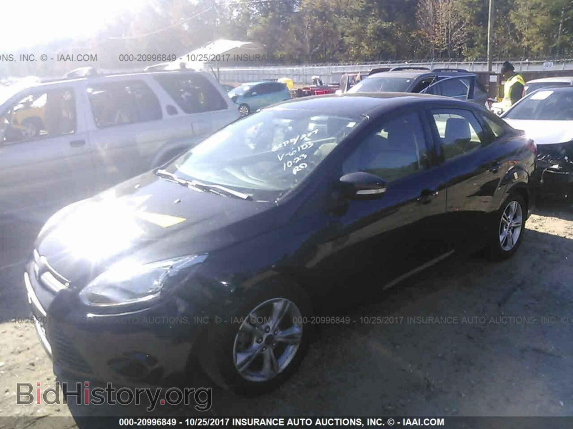 2014 Ford Focus - VIN: 1FADP3F29EL126103 - Фото 2