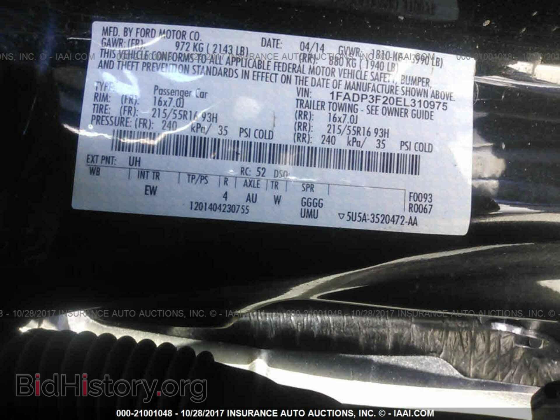 2014 Ford Focus - VIN: 1FADP3F20EL310975 - Photo 9