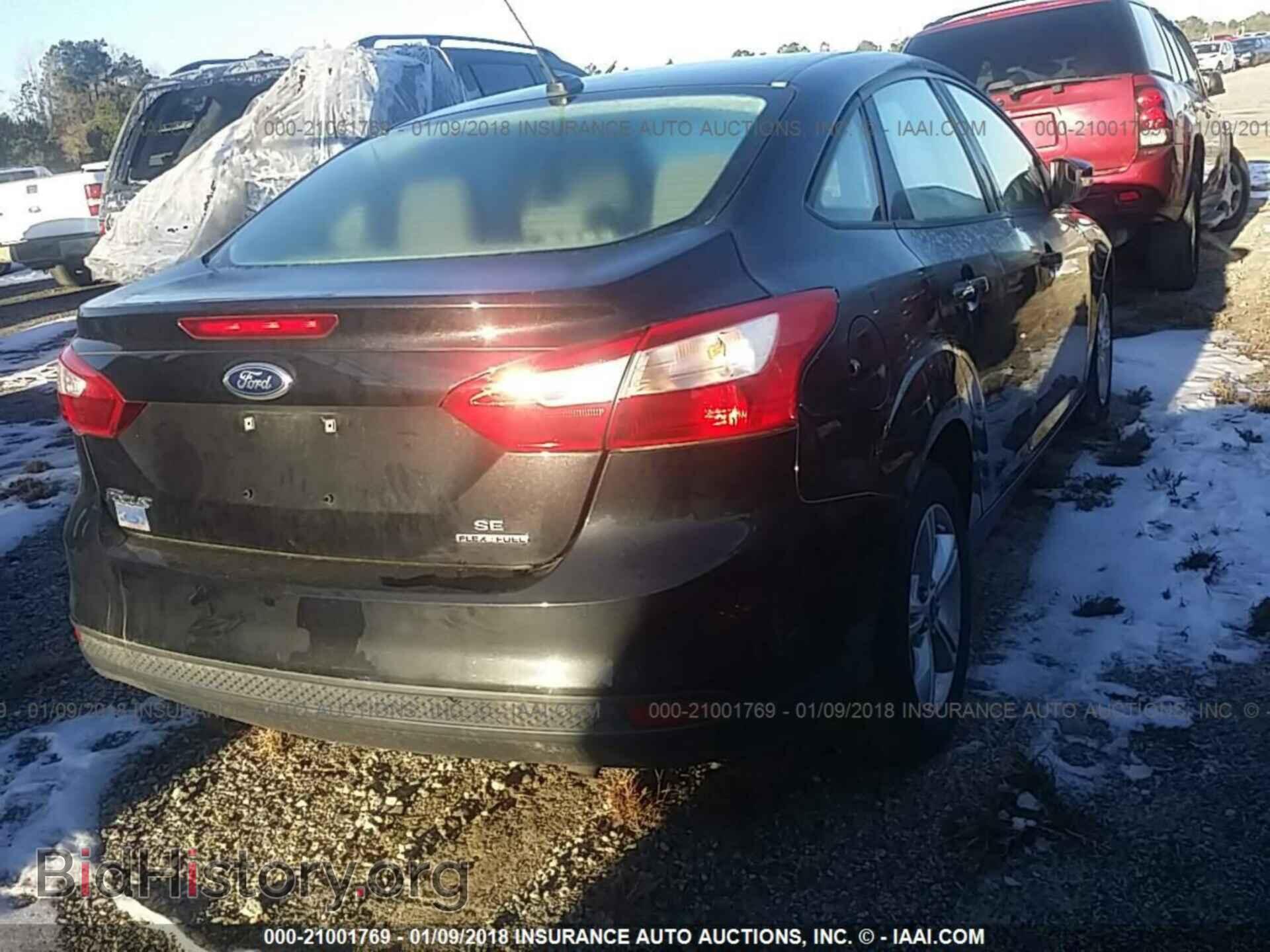 2013 Ford Focus - VIN: 1FADP3F26DL198519 - Photo 4