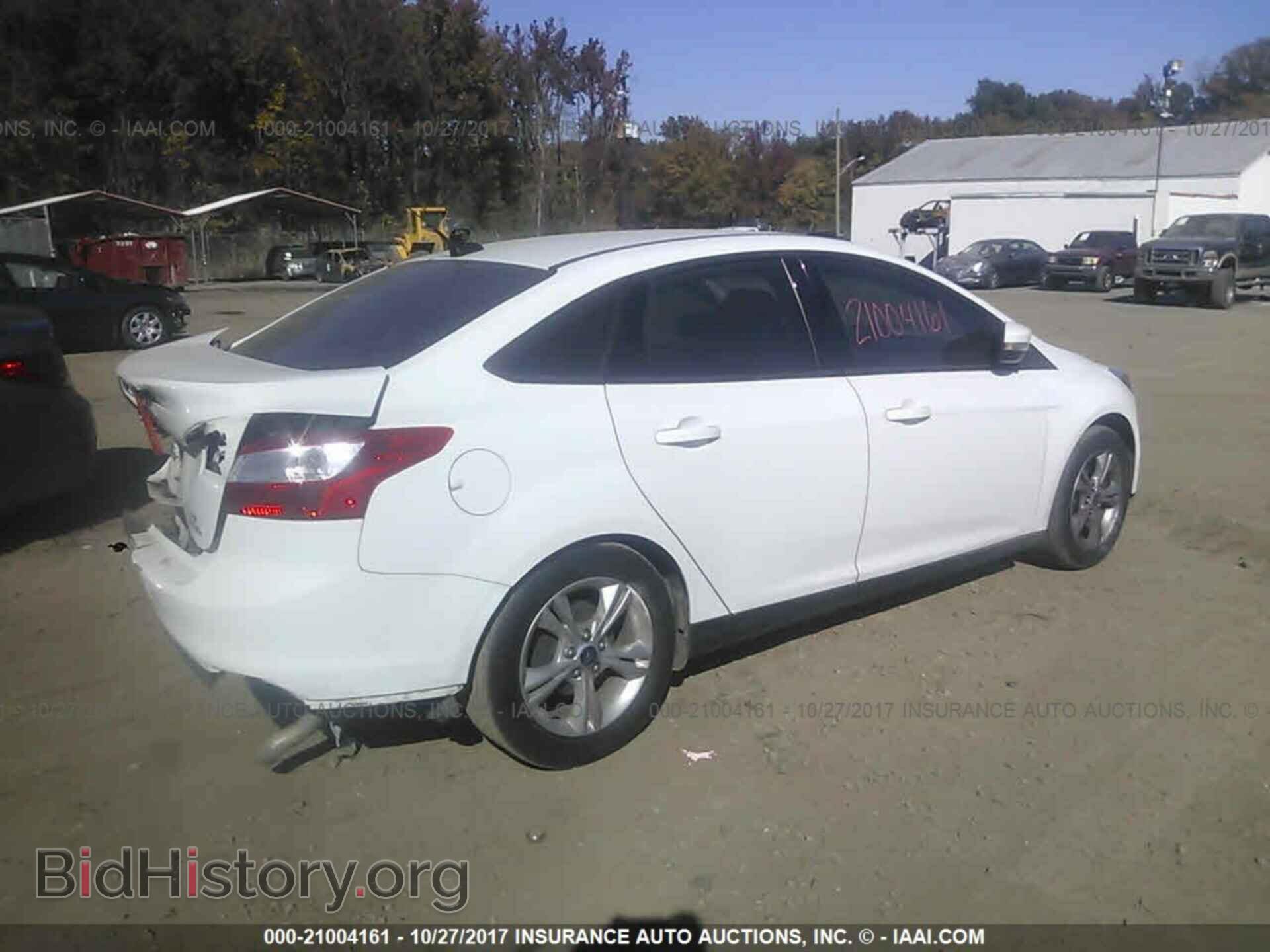 2014 Ford Focus - VIN: 1FADP3F20EL301161 - Photo 4
