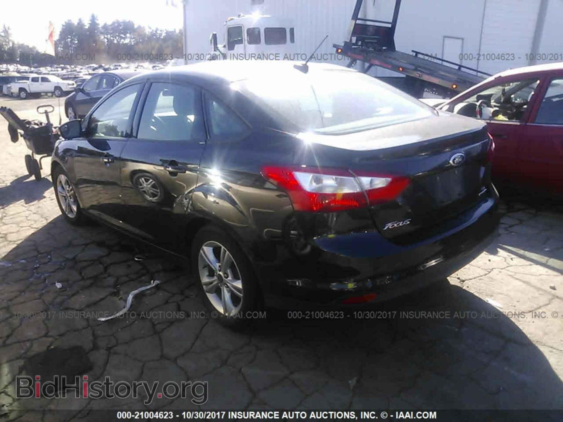 2014 Ford Focus - VIN: 1FADP3F20EL228566 - Photo 3