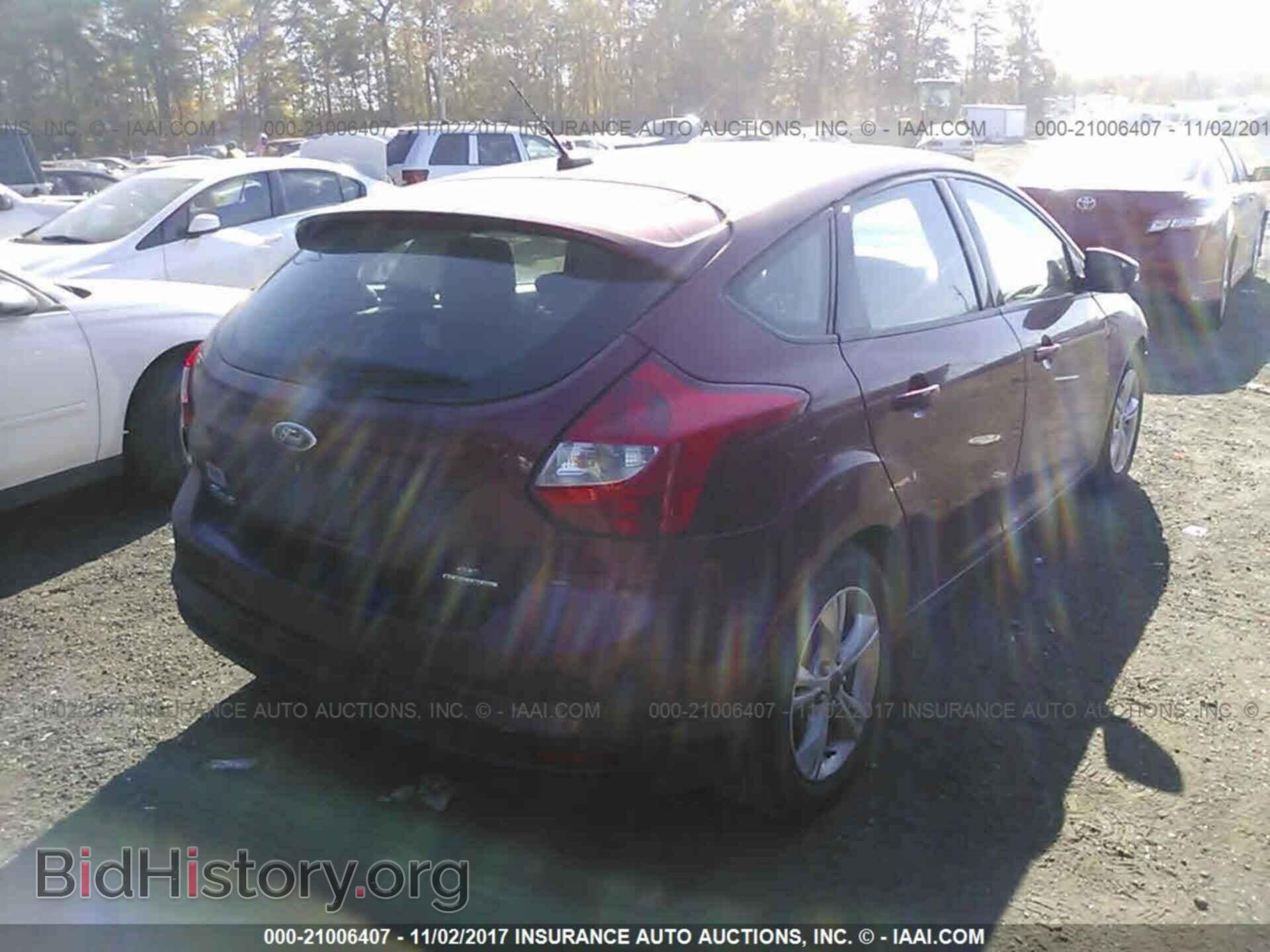 2013 Ford Focus - VIN: 1FADP3K26DL349302 - Photo 4