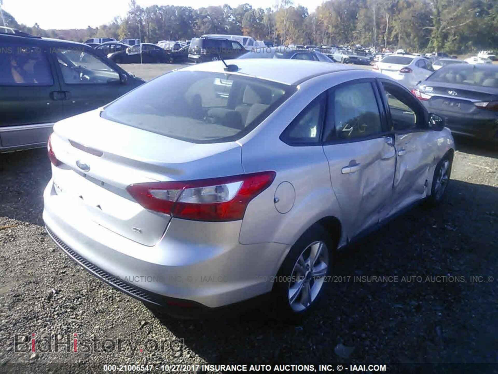 2013 Ford Focus - VIN: 1FADP3F25DL330377 - Фото 4