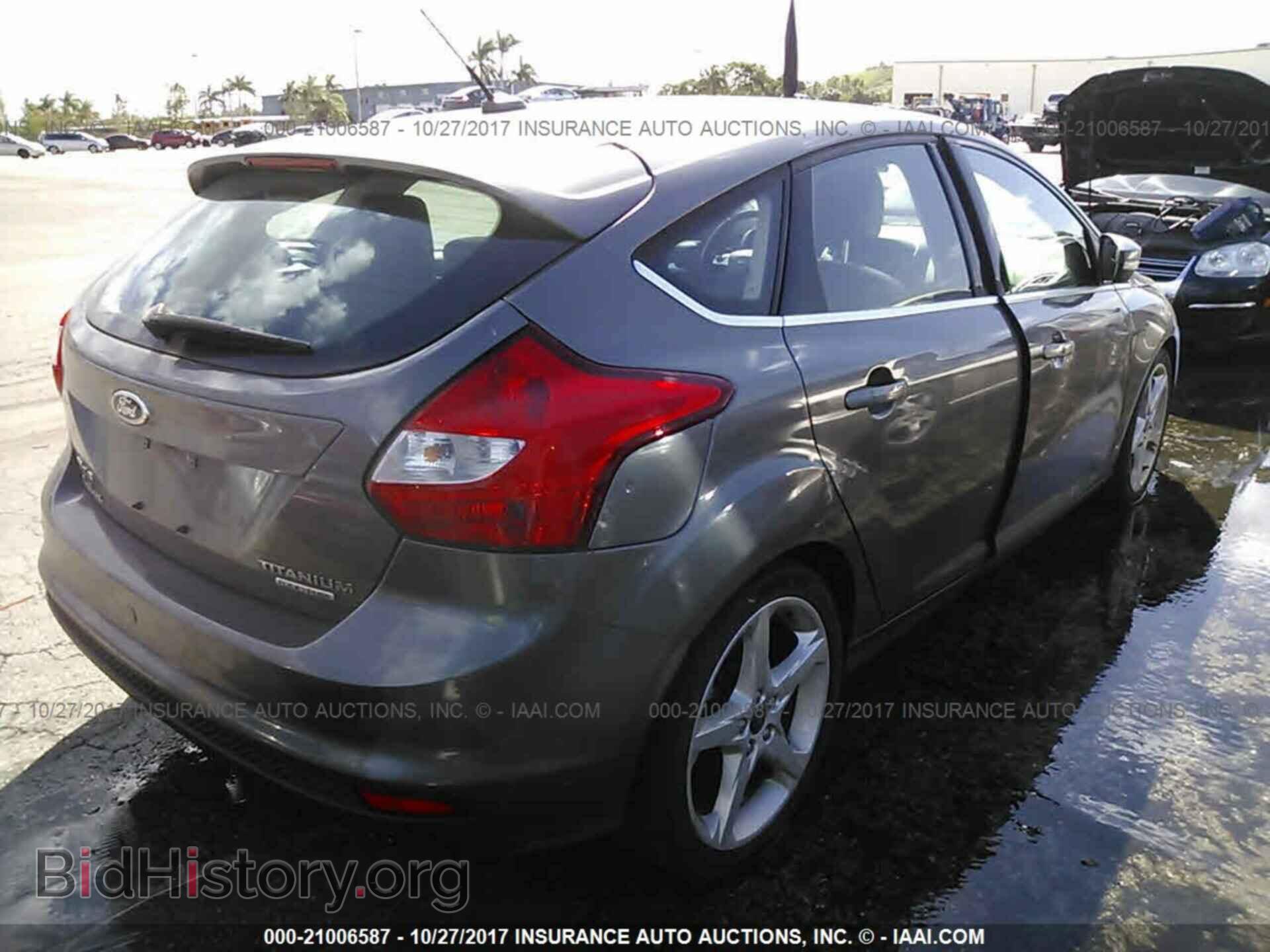 2012 Ford Focus - VIN: 1FAHP3N25CL402471 - Photo 4