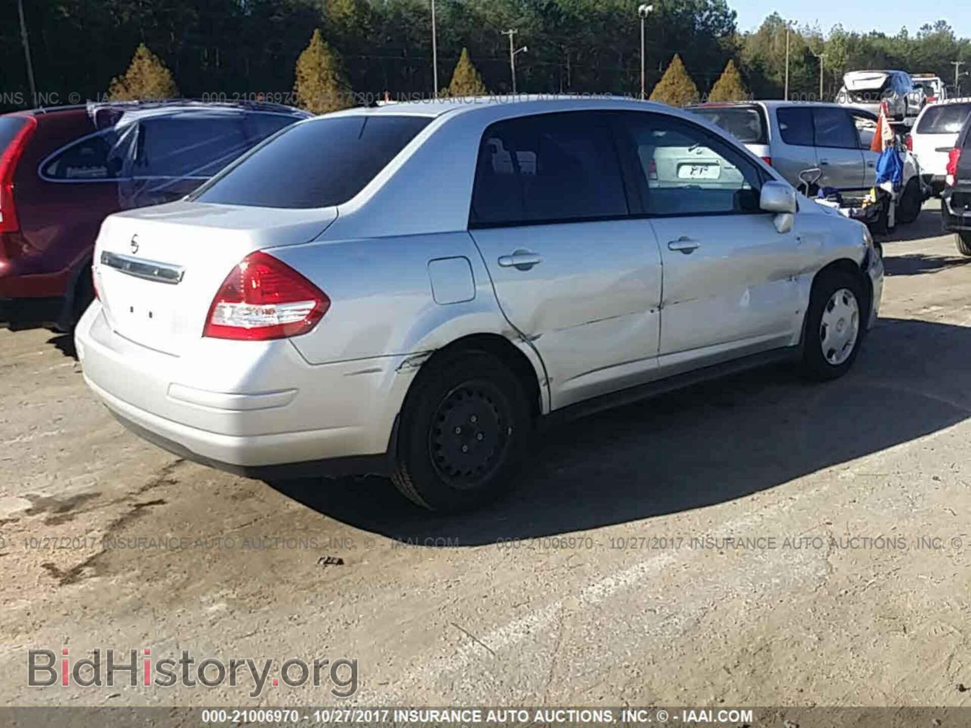 2011 Nissan Versa - VIN: 3N1BC1AP8BL433334 - Фото 4