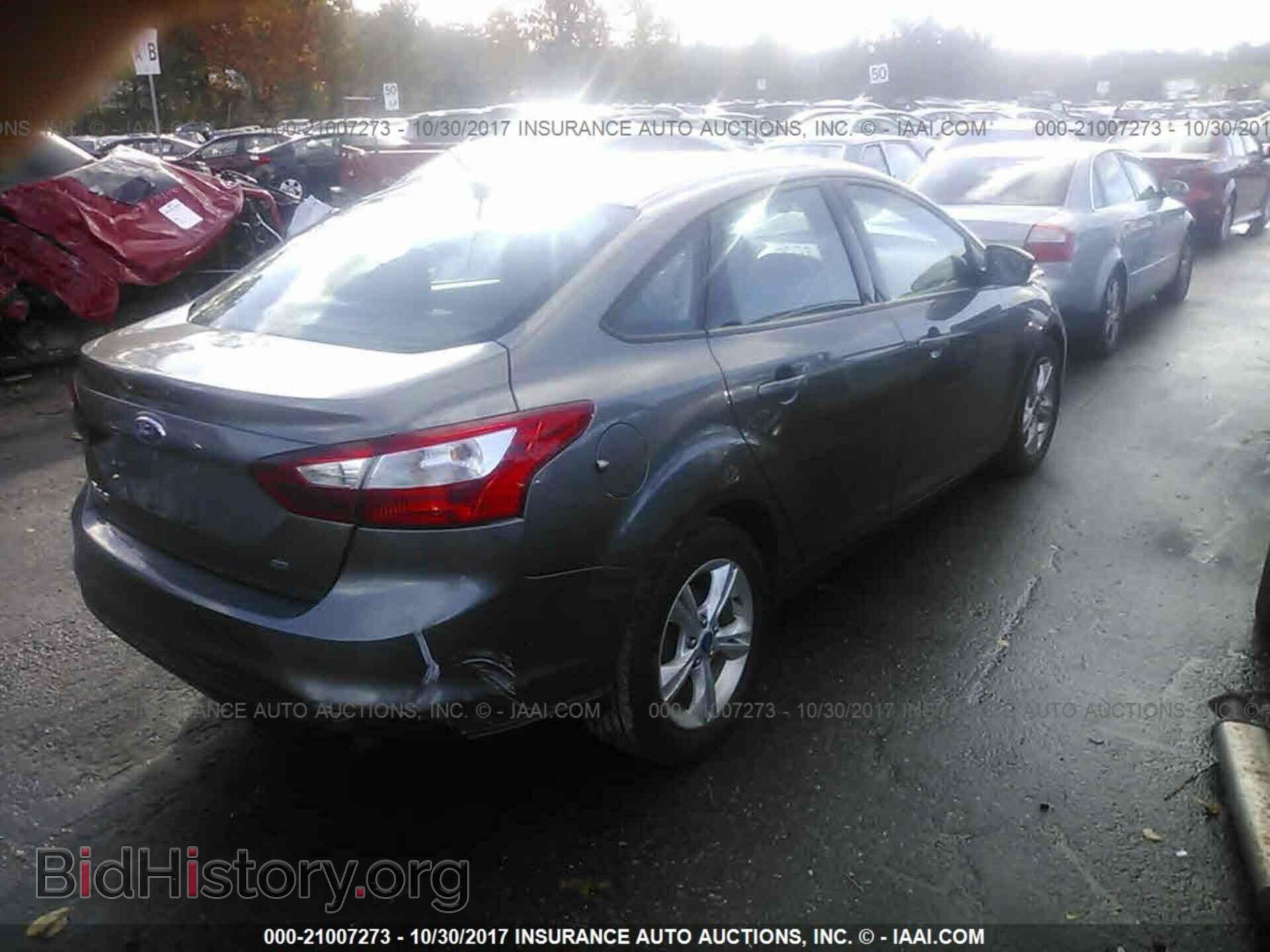 2013 Ford Focus - VIN: 1FADP3F2XDL282066 - Photo 4