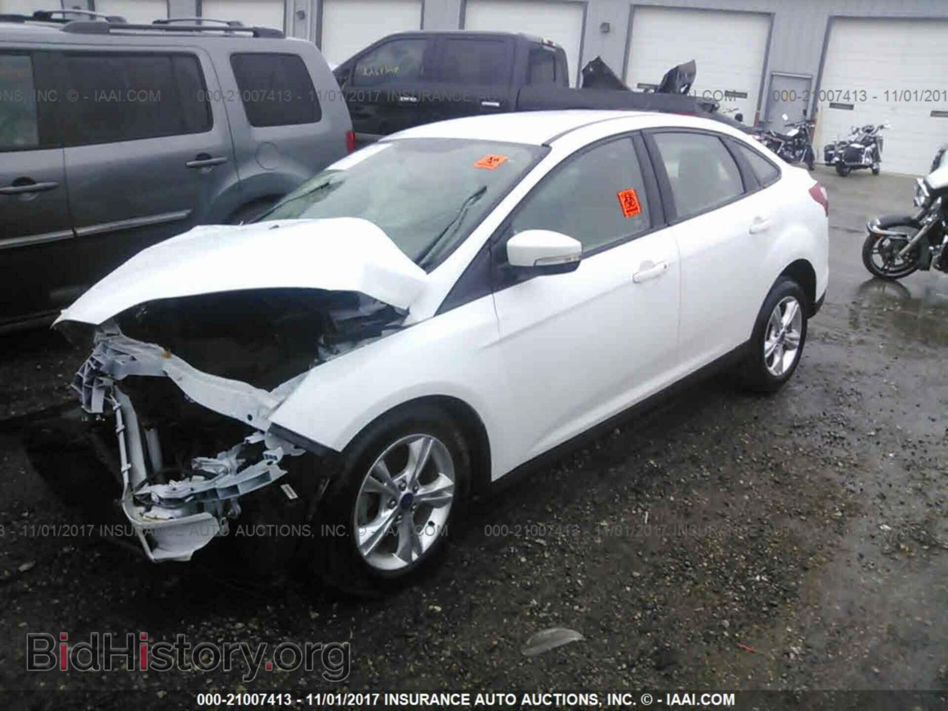 2014 Ford Focus - VIN: 1FADP3F24EL373318 - Photo 2