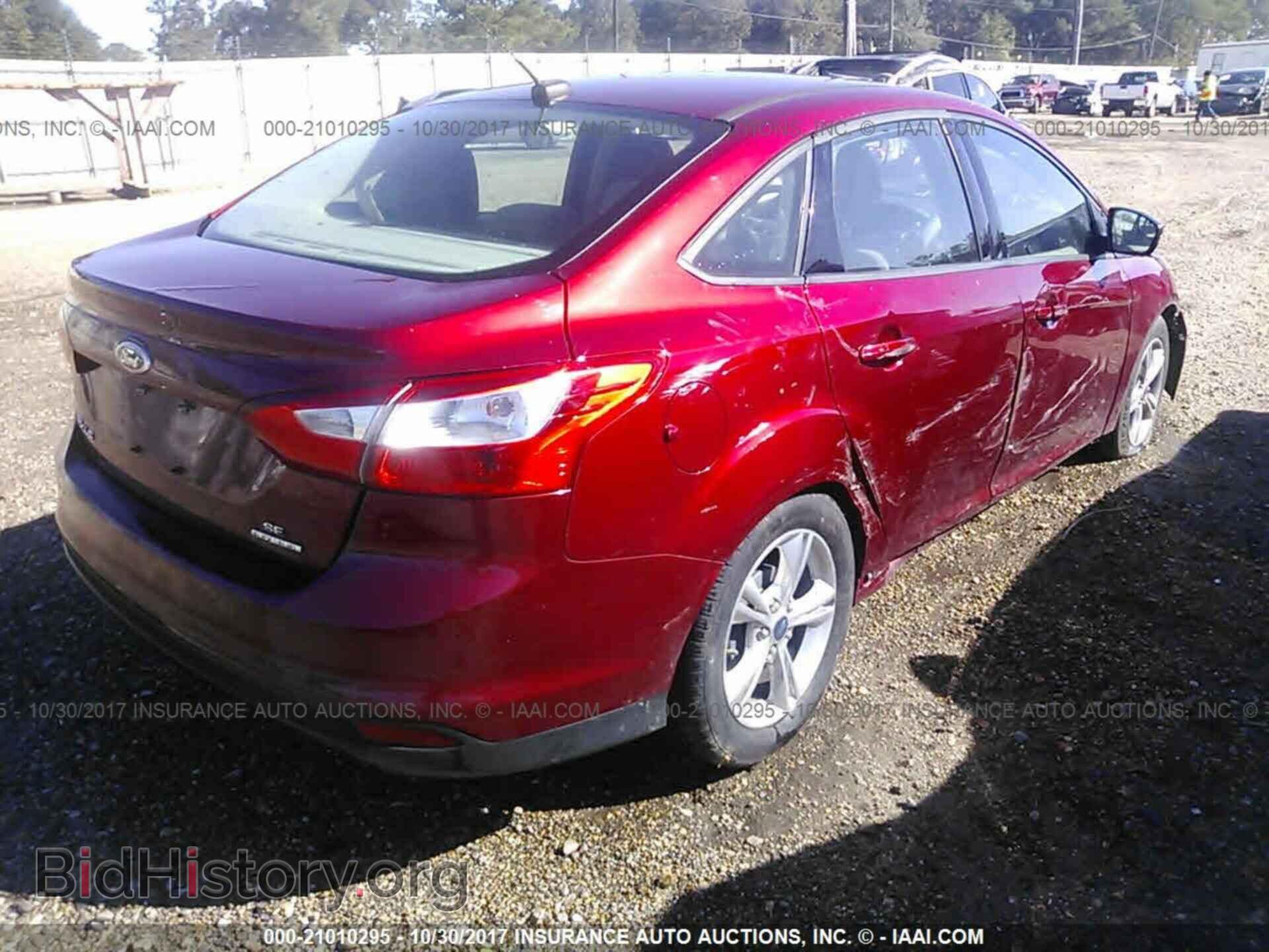 2014 Ford Focus - VIN: 1FADP3F23EL367512 - Photo 4