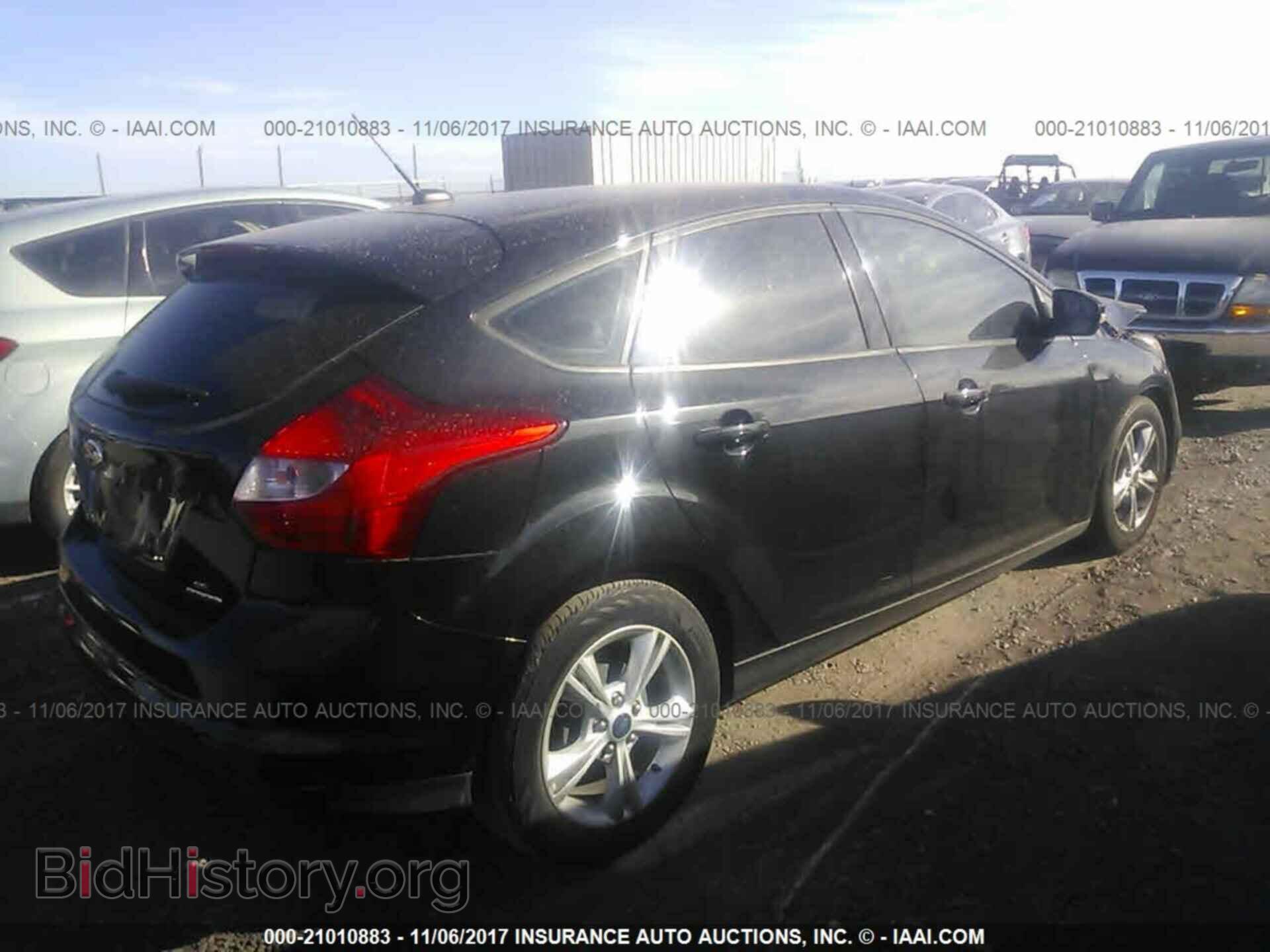 2014 Ford Focus - VIN: 1FADP3K29EL442350 - Photo 4