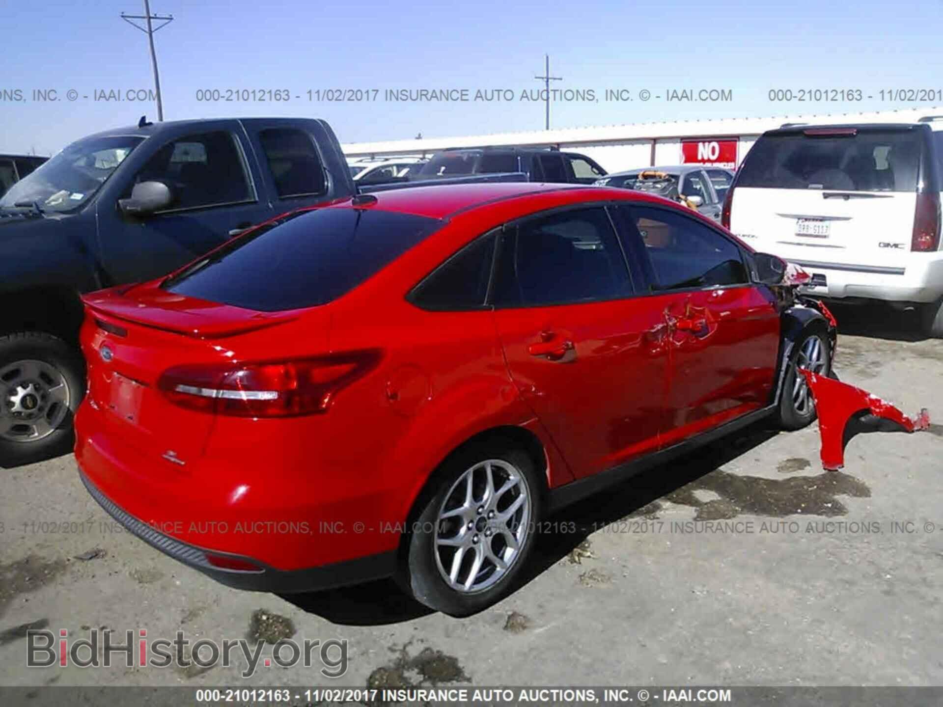 2015 Ford Focus - VIN: 1FADP3F27FL296459 - Photo 4