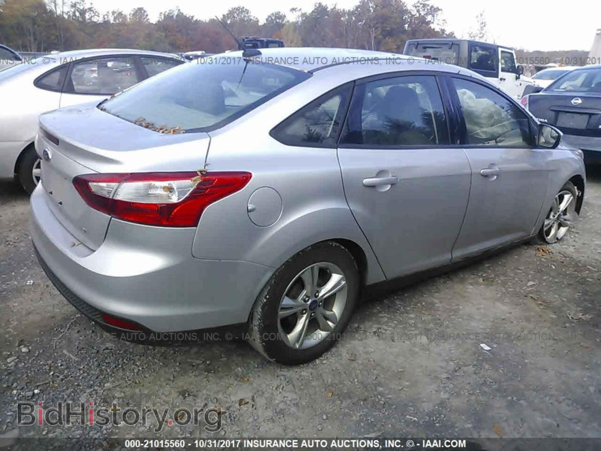2014 Ford Focus - VIN: 1FADP3F24EL255396 - Photo 4