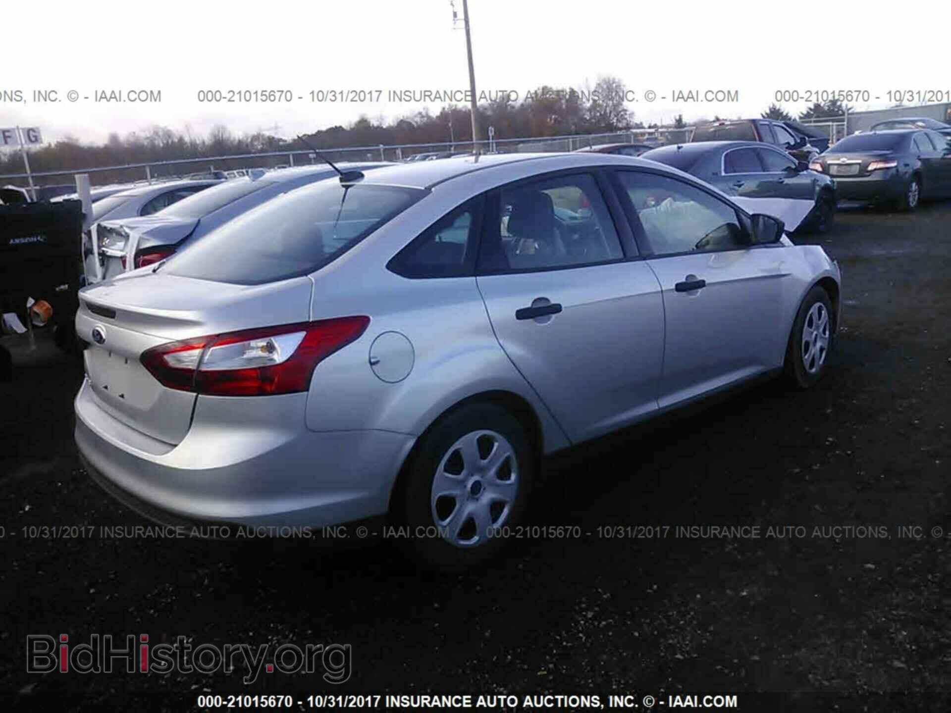 2014 Ford Focus - VIN: 1FADP3E23EL418153 - Photo 4