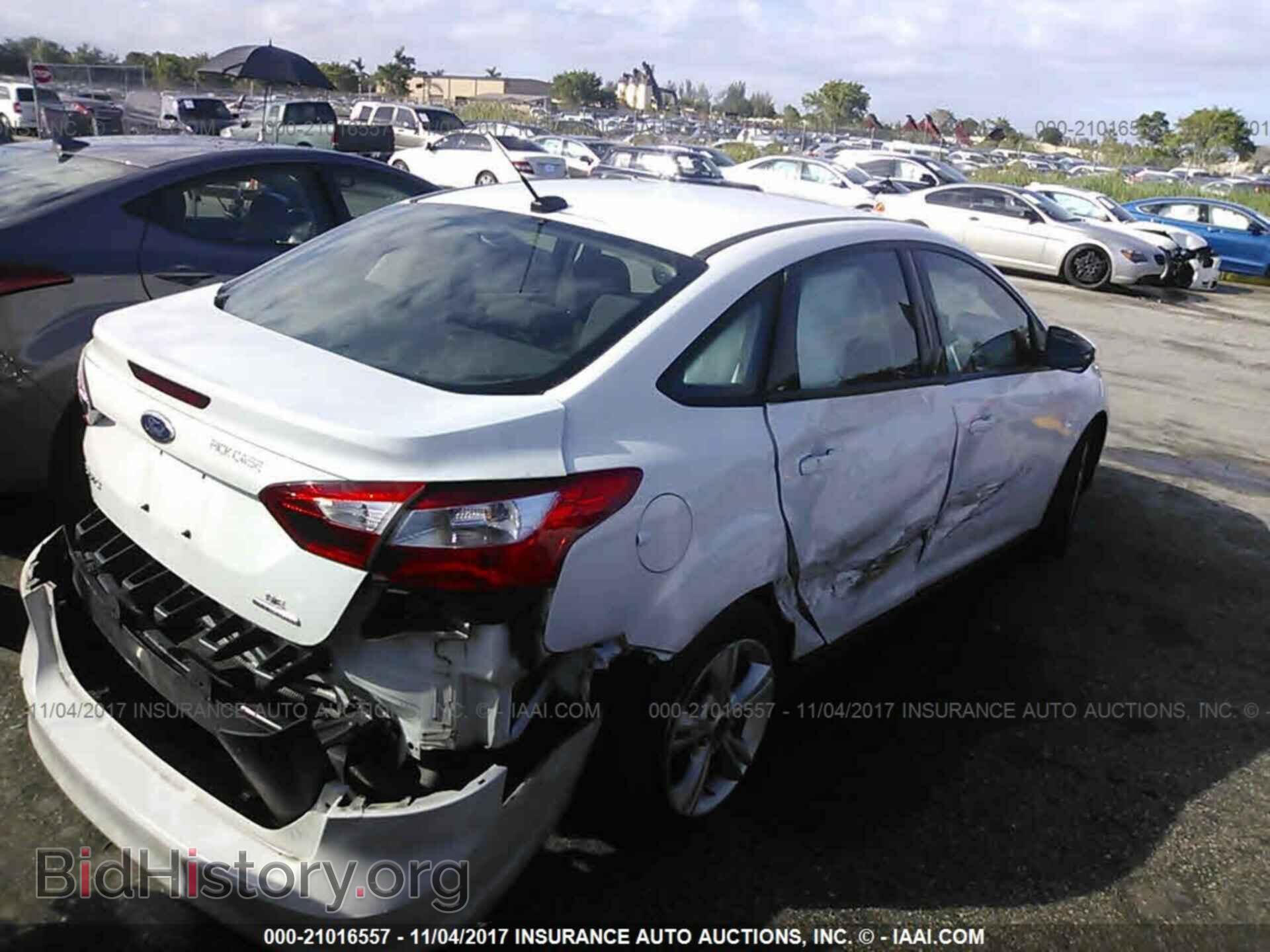 2014 Ford Focus - VIN: 1FADP3F27EL191094 - Photo 4