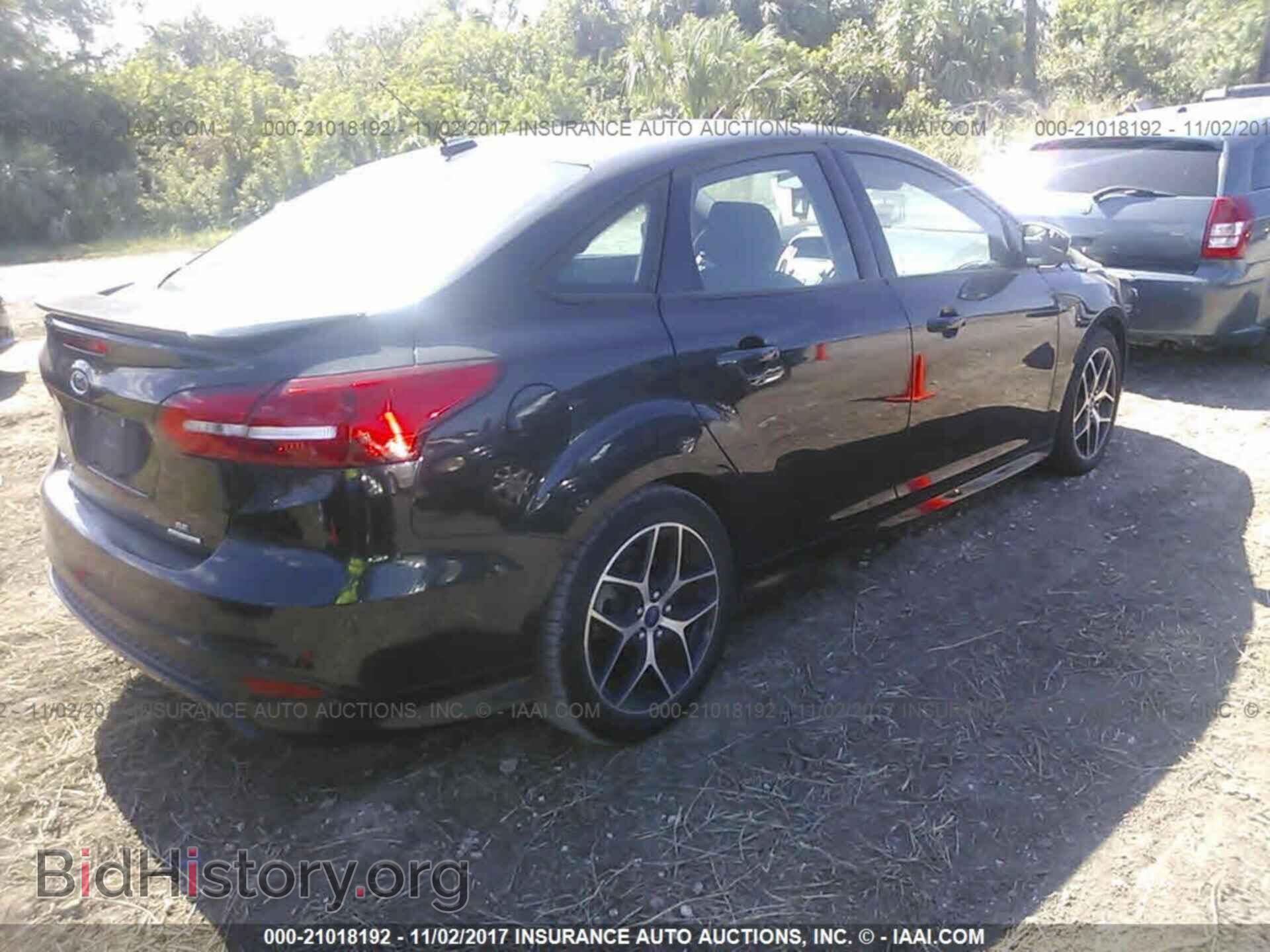 2015 Ford Focus - VIN: 1FADP3F25FL238771 - Photo 4