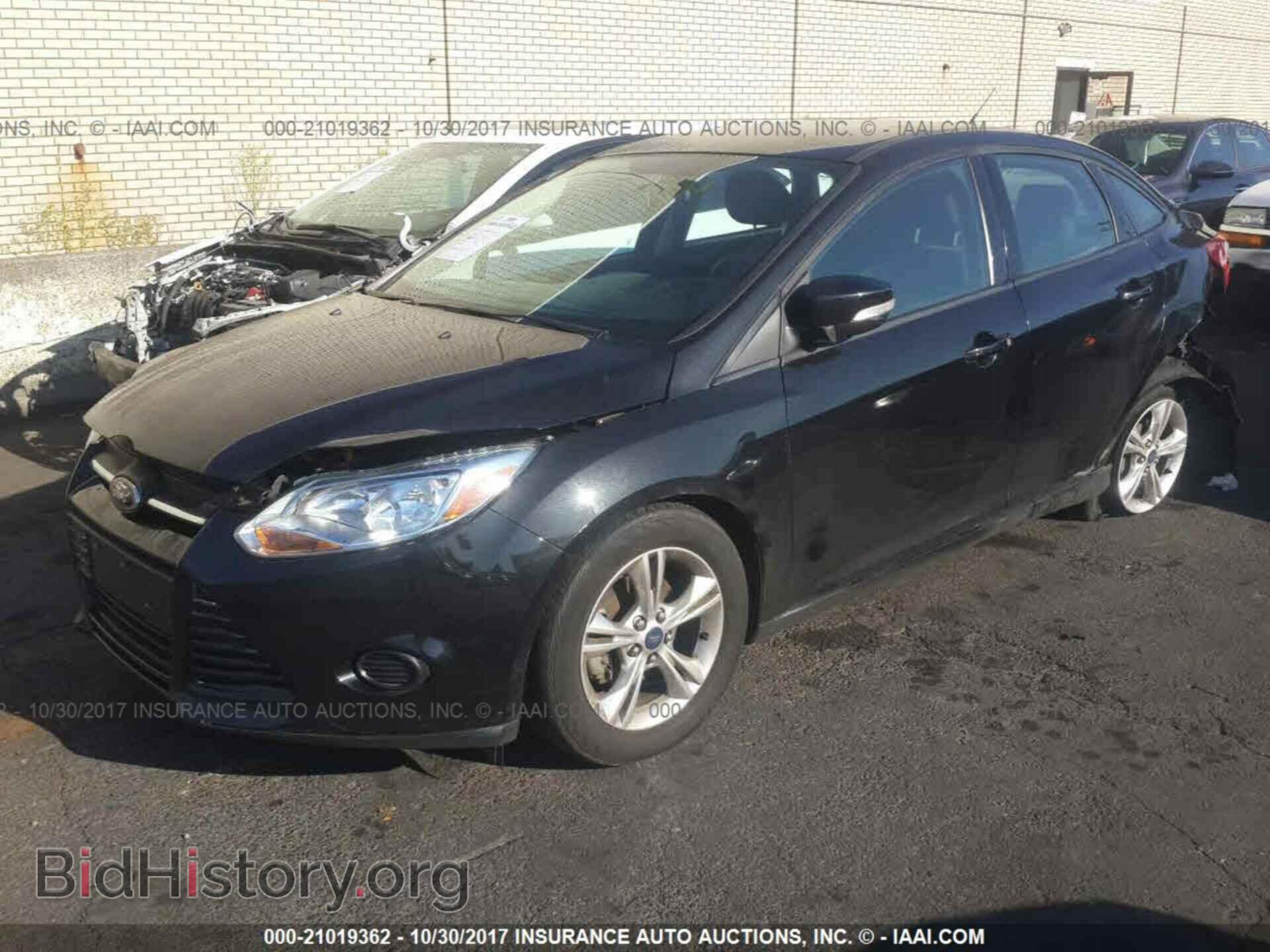 2014 Ford Focus - VIN: 1FADP3F21EL199739 - Photo 2