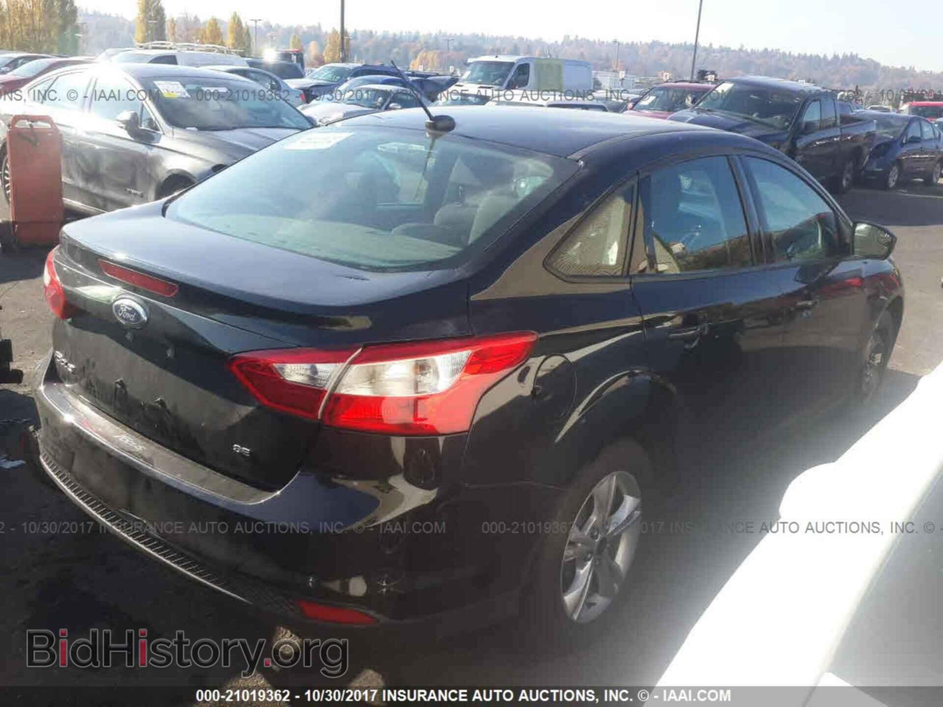 2014 Ford Focus - VIN: 1FADP3F21EL199739 - Photo 4