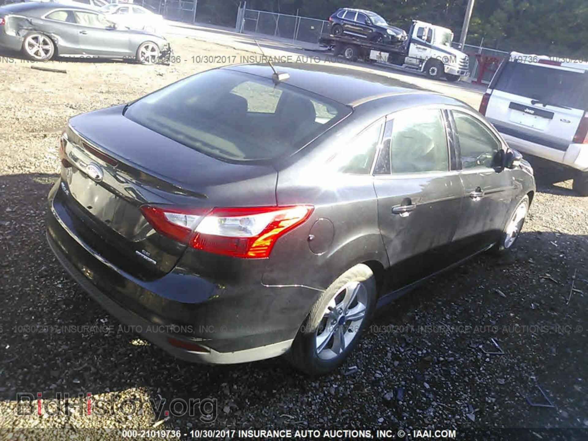 2014 Ford Focus - VIN: 1FADP3F20EL251314 - Photo 4