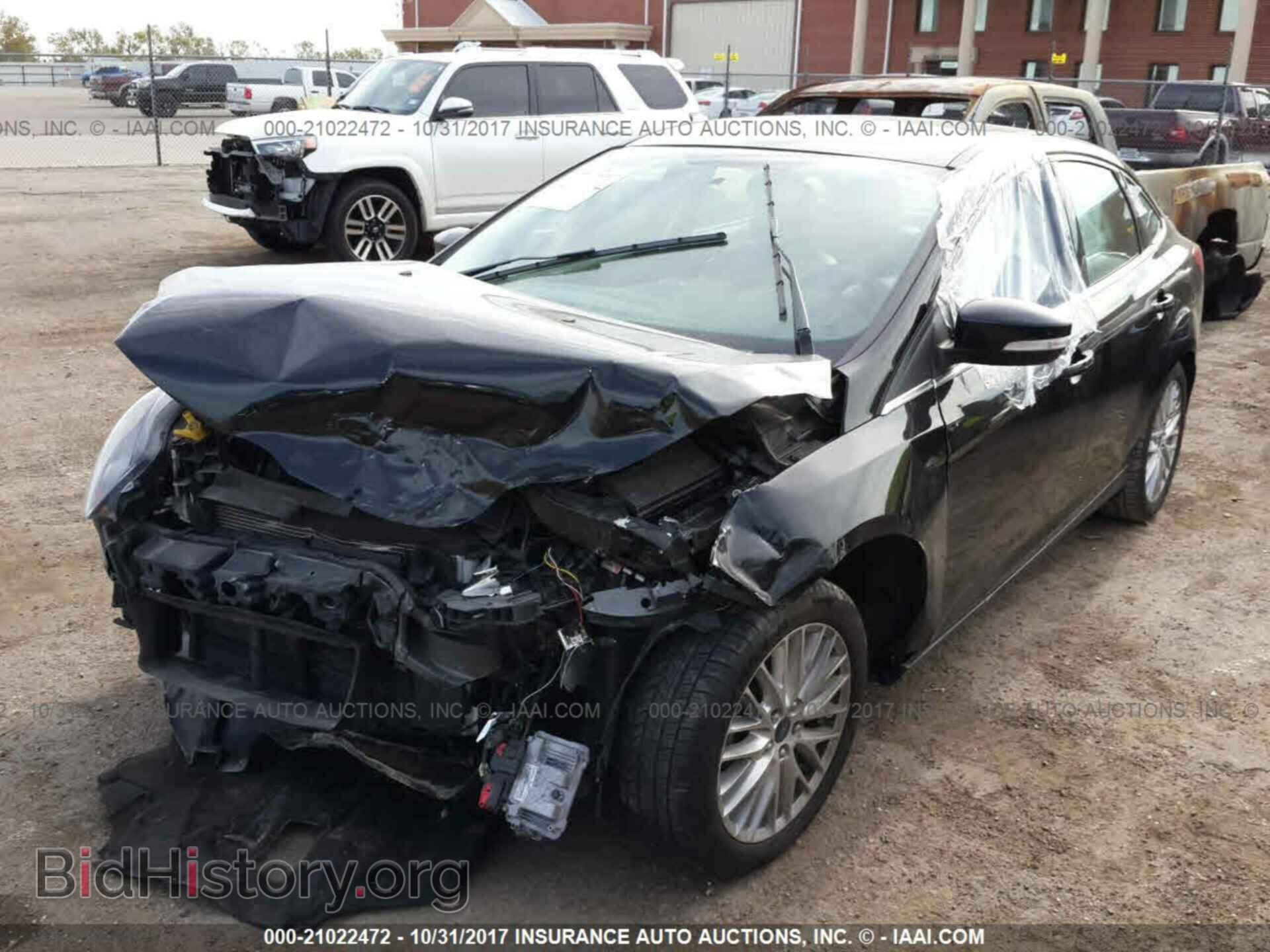2014 Ford Focus - VIN: 1FADP3J21EL417847 - Фото 2