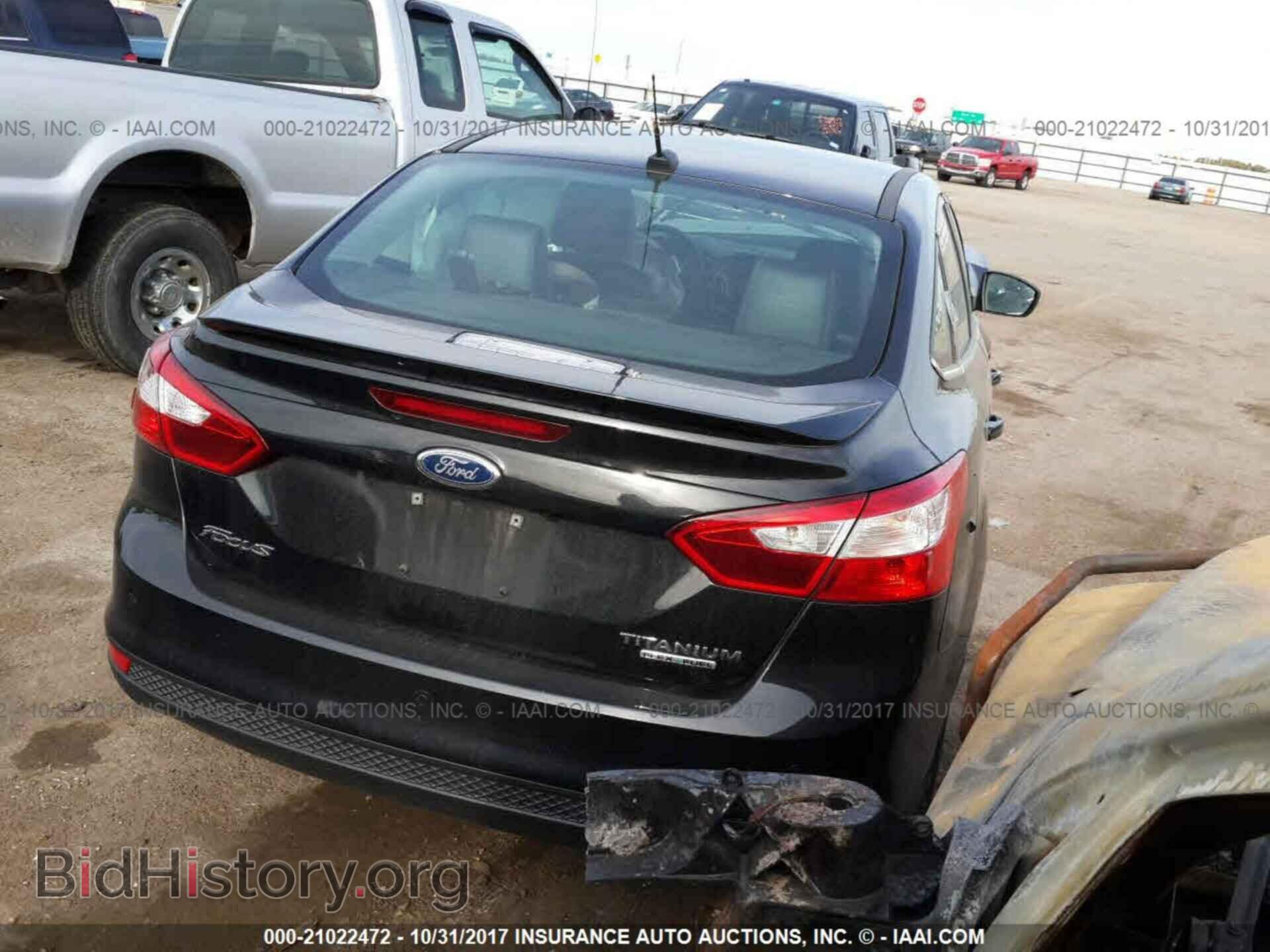 2014 Ford Focus - VIN: 1FADP3J21EL417847 - Фото 4