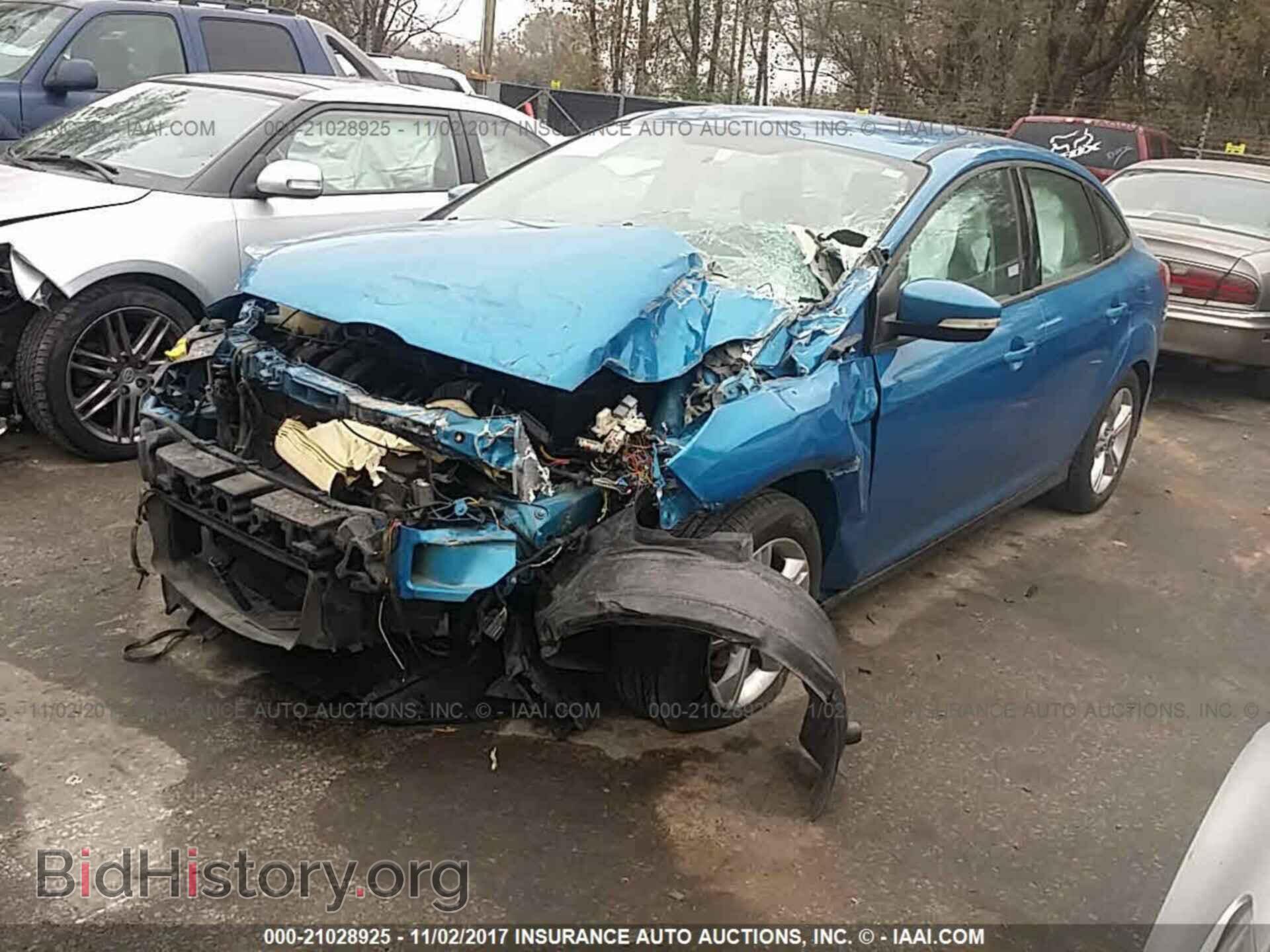 2014 Ford Focus - VIN: 1FADP3F21EL143980 - Photo 2