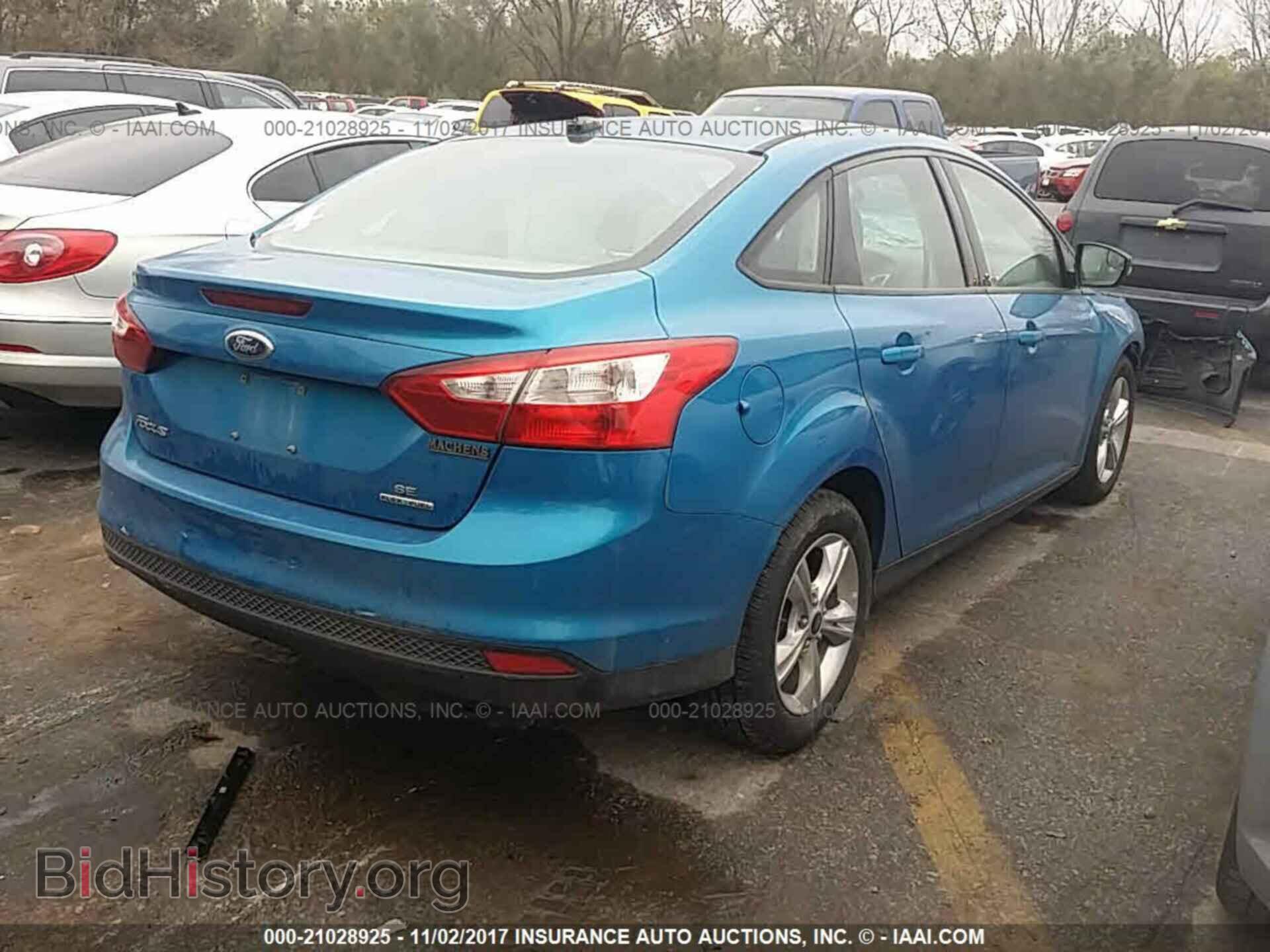 2014 Ford Focus - VIN: 1FADP3F21EL143980 - Photo 4