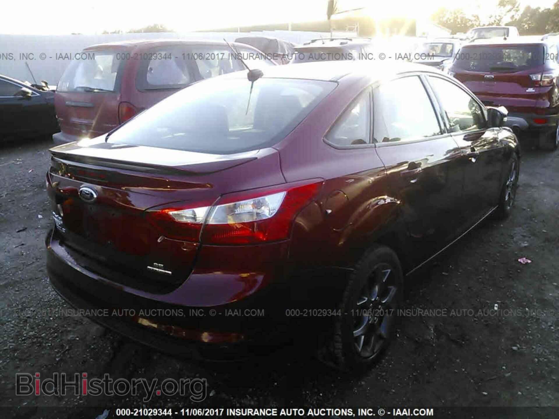2014 Ford Focus - VIN: 1FADP3F21EL457984 - Photo 4