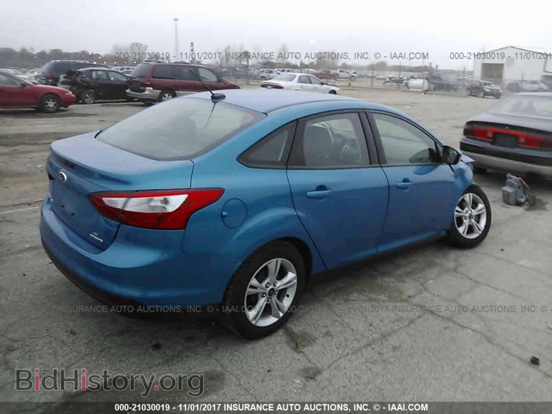 2014 Ford Focus - VIN: 1FADP3F2XEL346639 - Photo 4