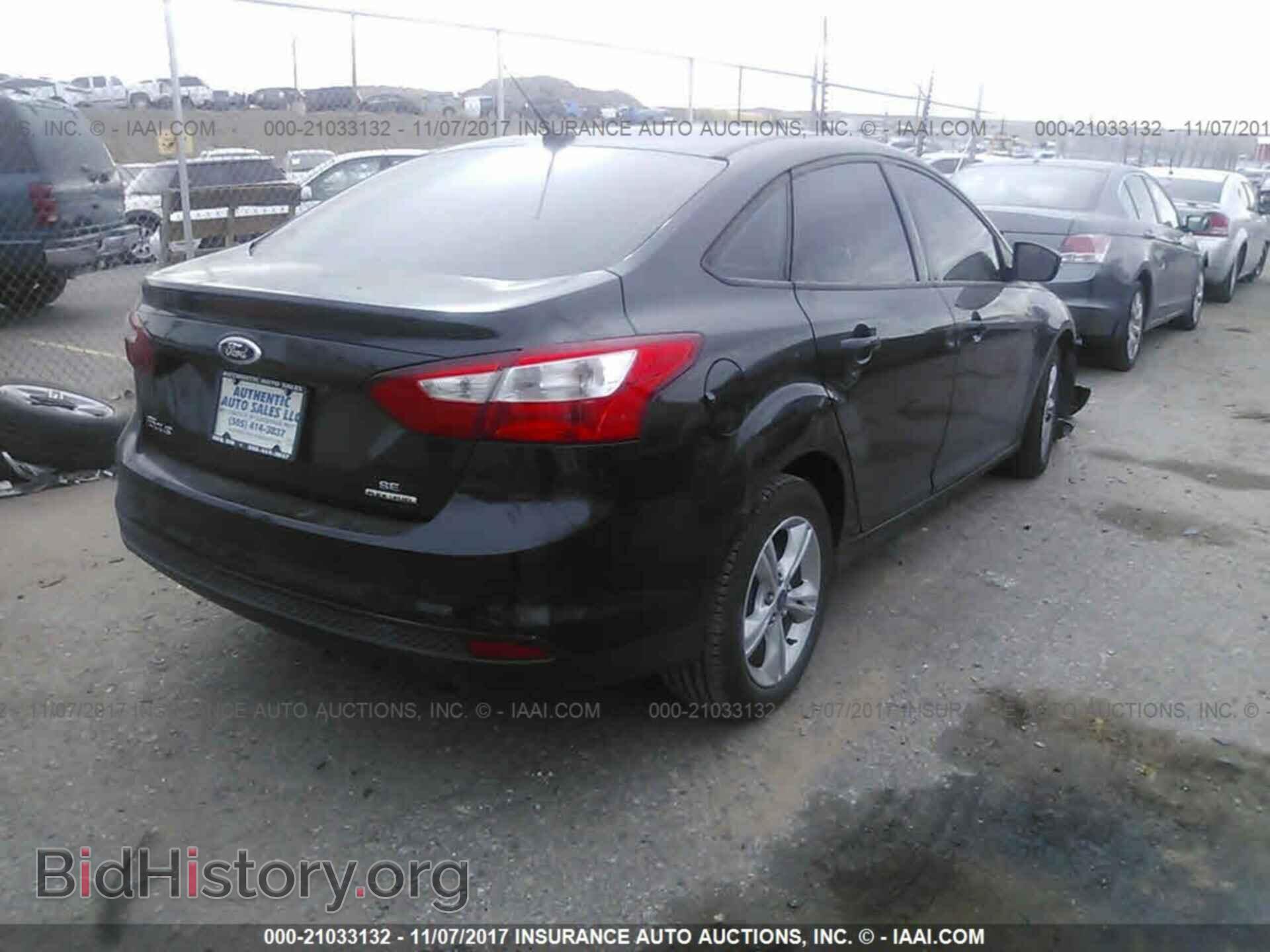 2013 Ford Focus - VIN: 1FADP3F24DL204561 - Фото 4