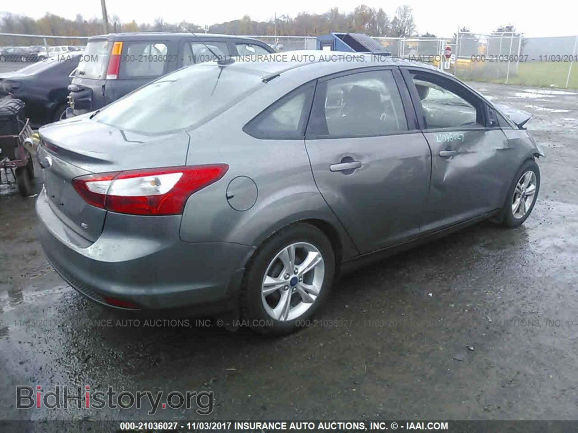 2014 Ford Focus - VIN: 1FADP3F21EL158981 - Photo 4
