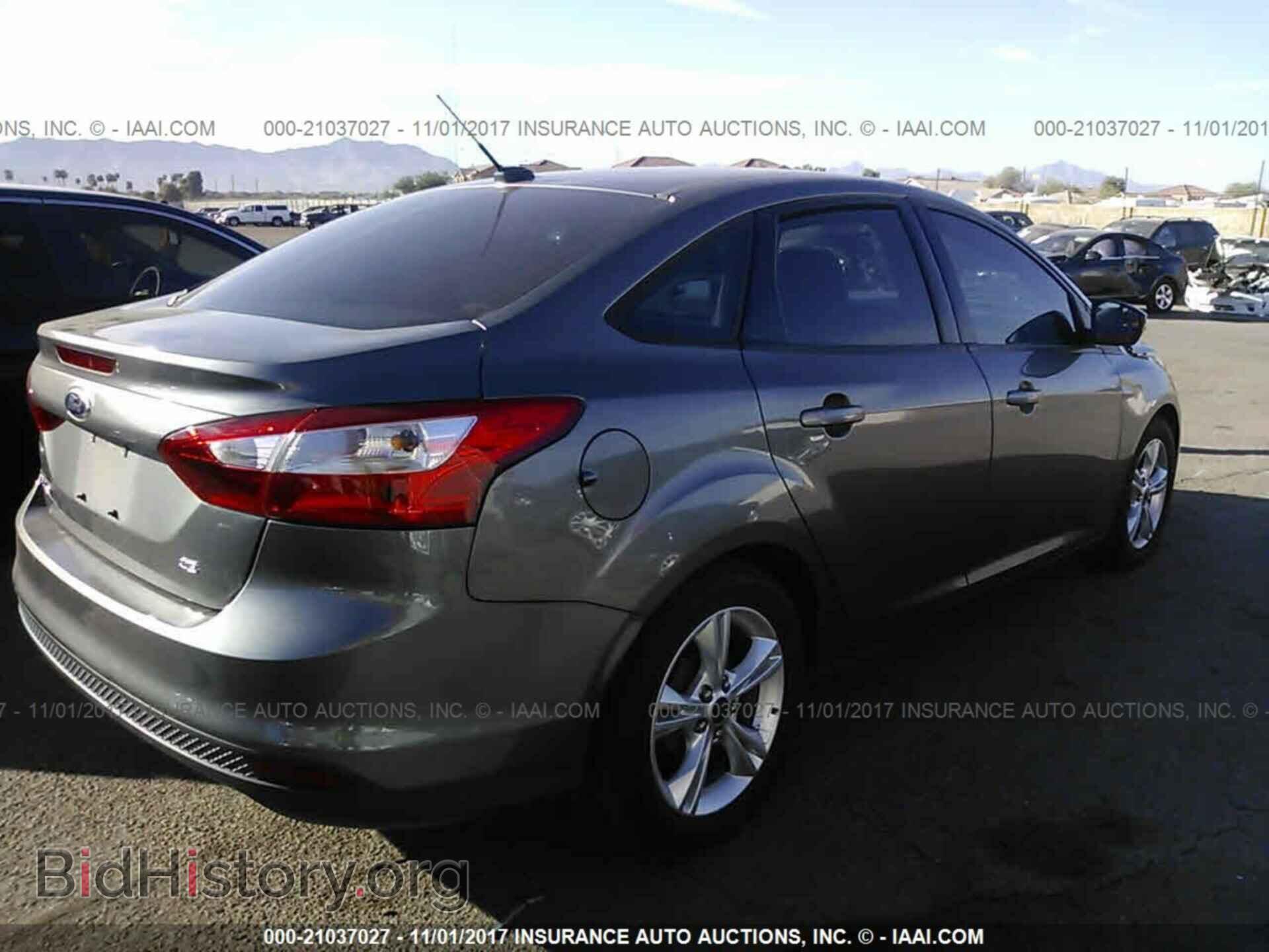 2014 Ford Focus - VIN: 1FADP3F22EL150470 - Photo 4