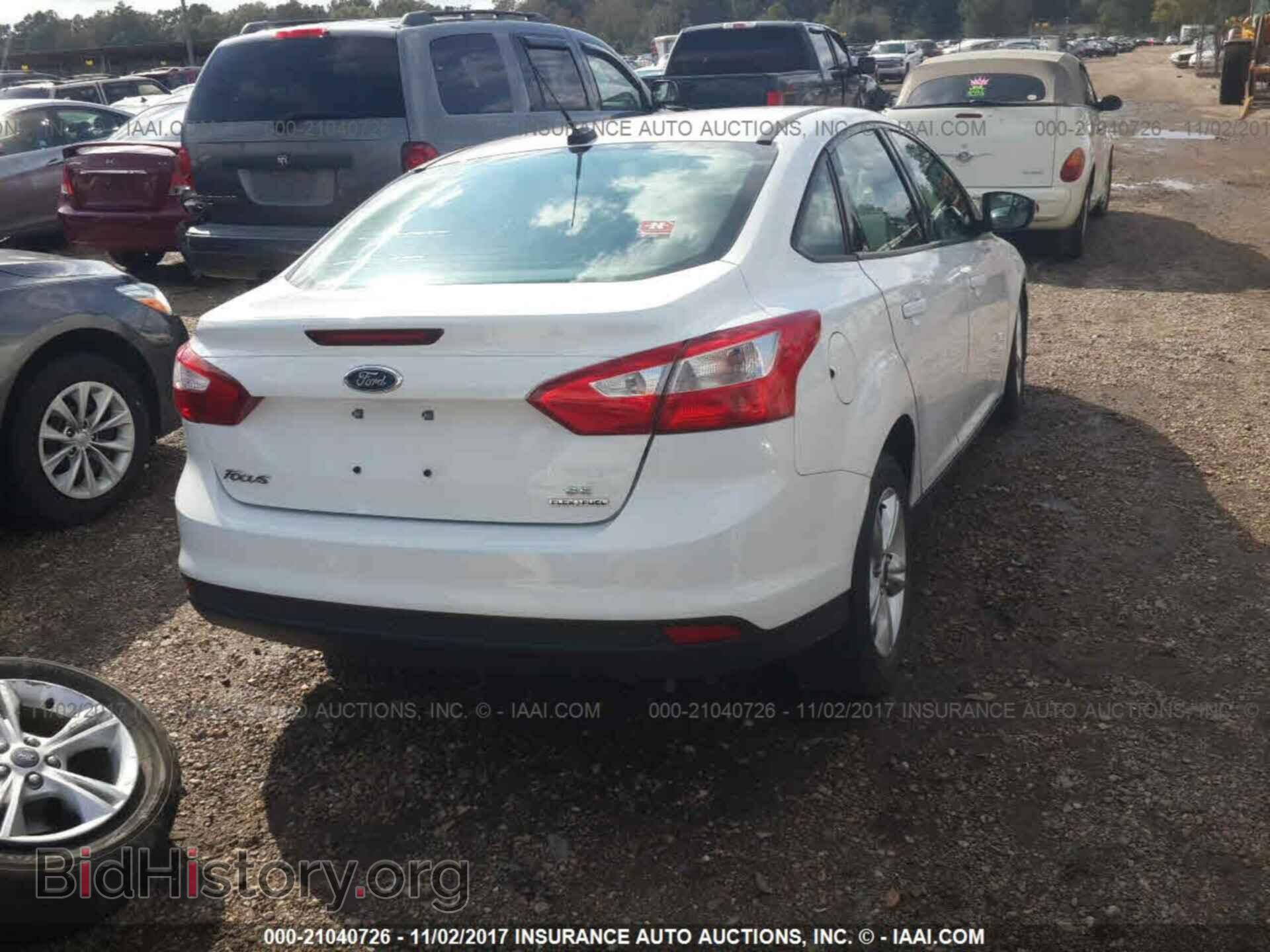 2014 Ford Focus - VIN: 1FADP3F25EL145067 - Photo 4