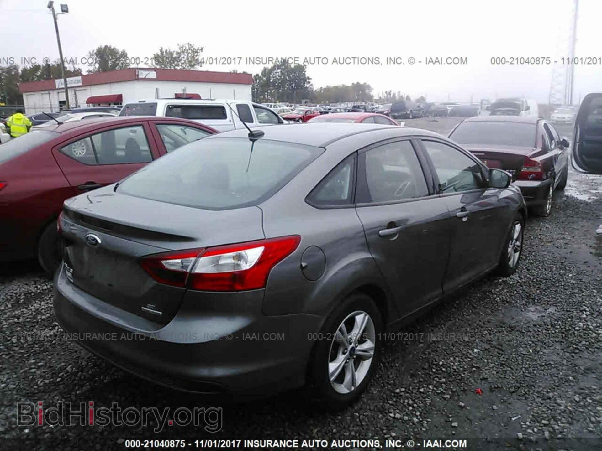 2014 Ford Focus - VIN: 1FADP3F28EL400892 - Фото 4