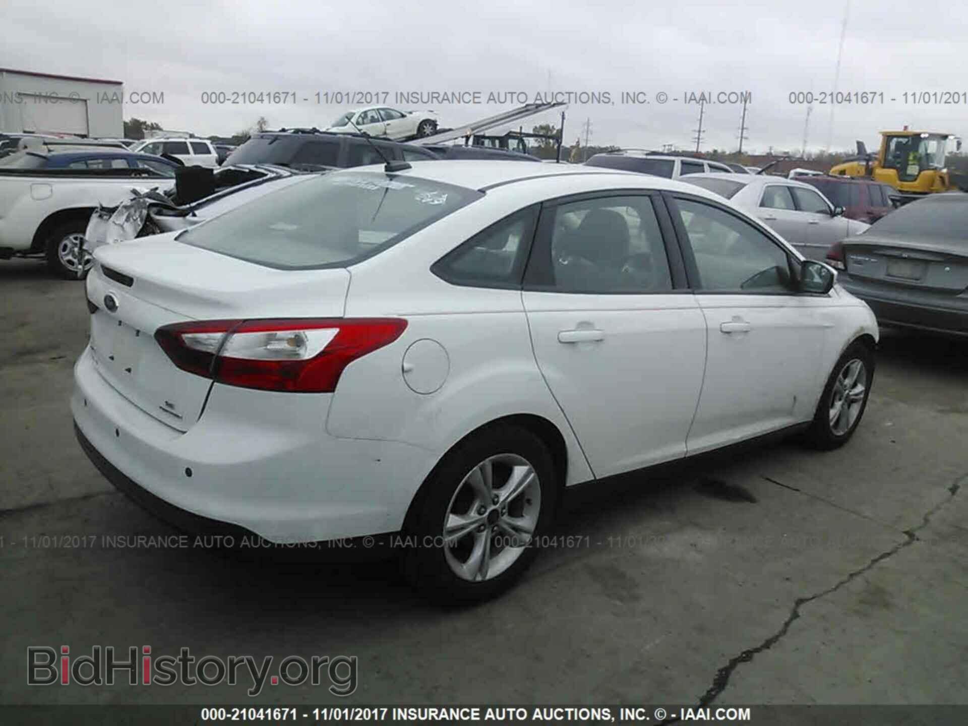 2014 Ford Focus - VIN: 1FADP3F2XEL460799 - Photo 4