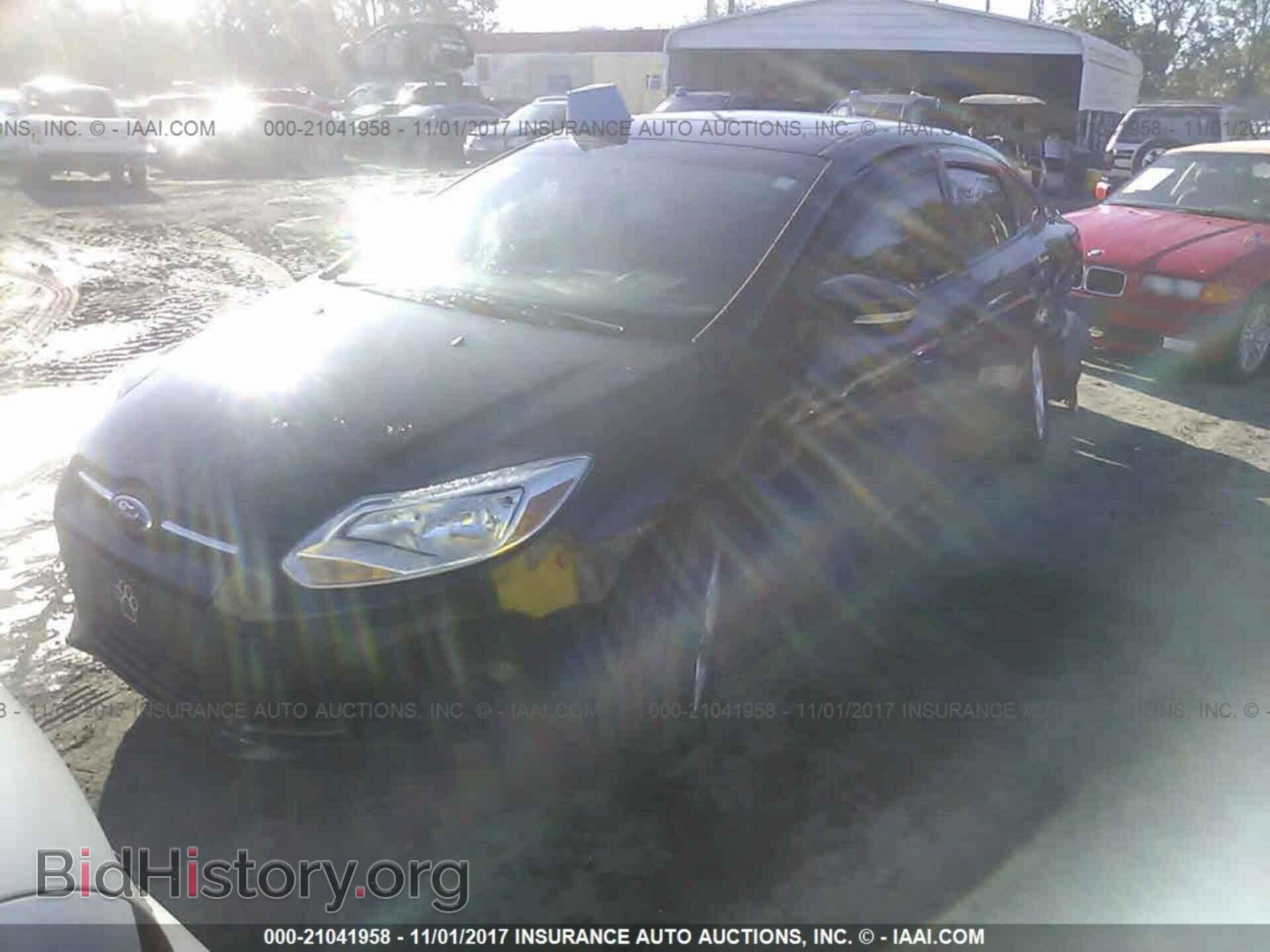 2014 Ford Focus - VIN: 1FADP3F24EL244284 - Фото 2