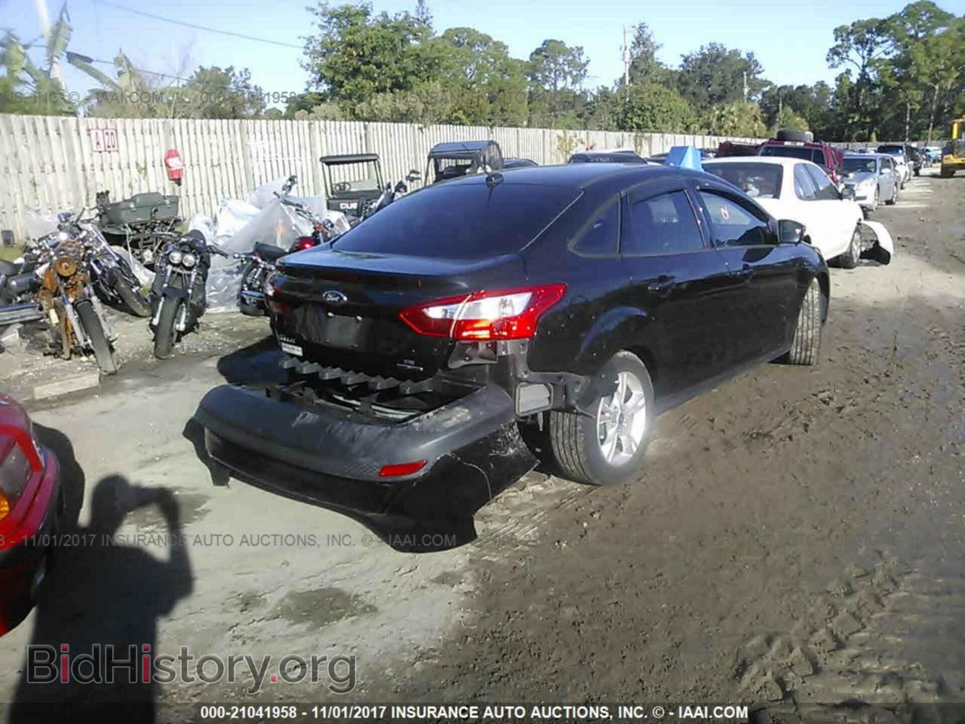 2014 Ford Focus - VIN: 1FADP3F24EL244284 - Фото 4