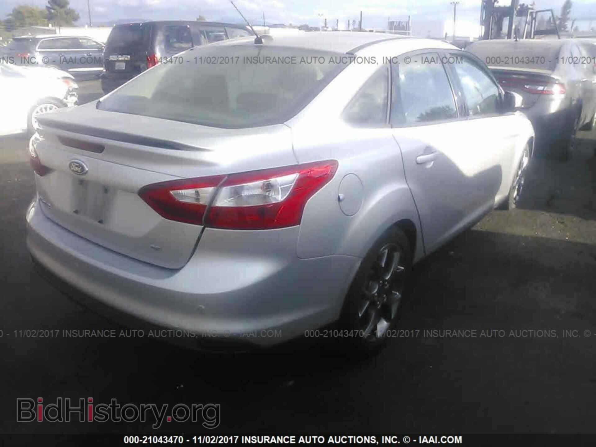 2014 Ford Focus - VIN: 1FADP3F21EL432227 - Фото 4