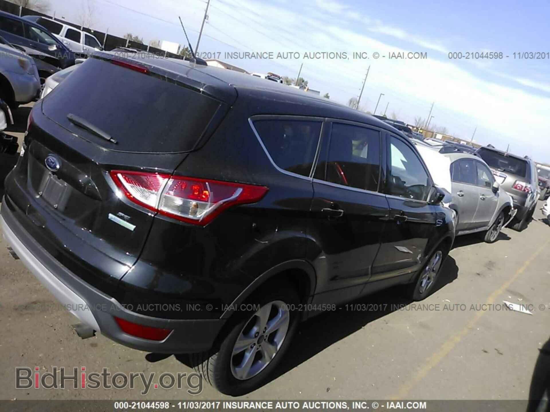 2014 Ford Escape - VIN: 1FMCU0GX5EUD38574 - Фото 4