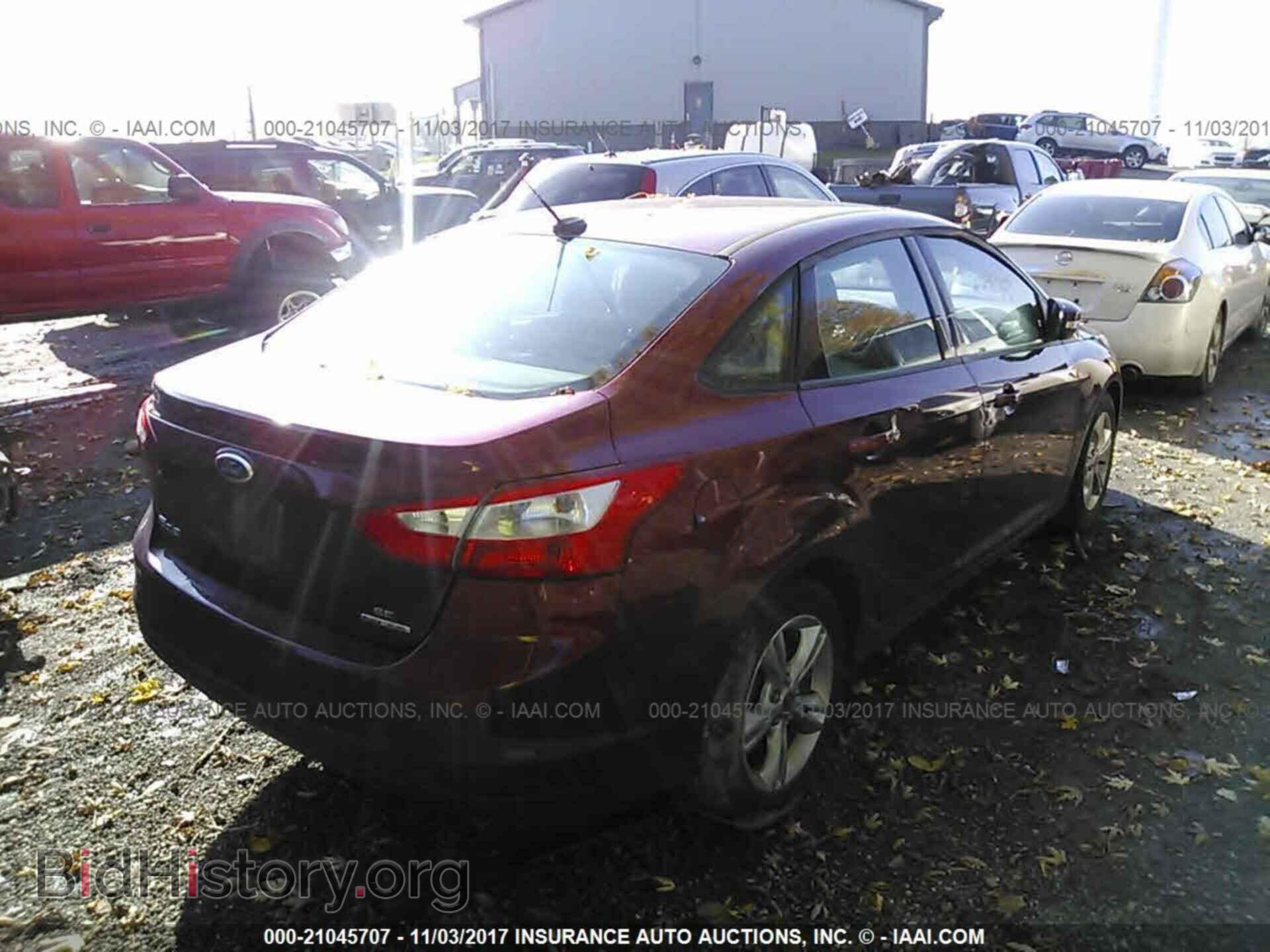 2014 Ford Focus - VIN: 1FADP3F20EL107021 - Photo 4