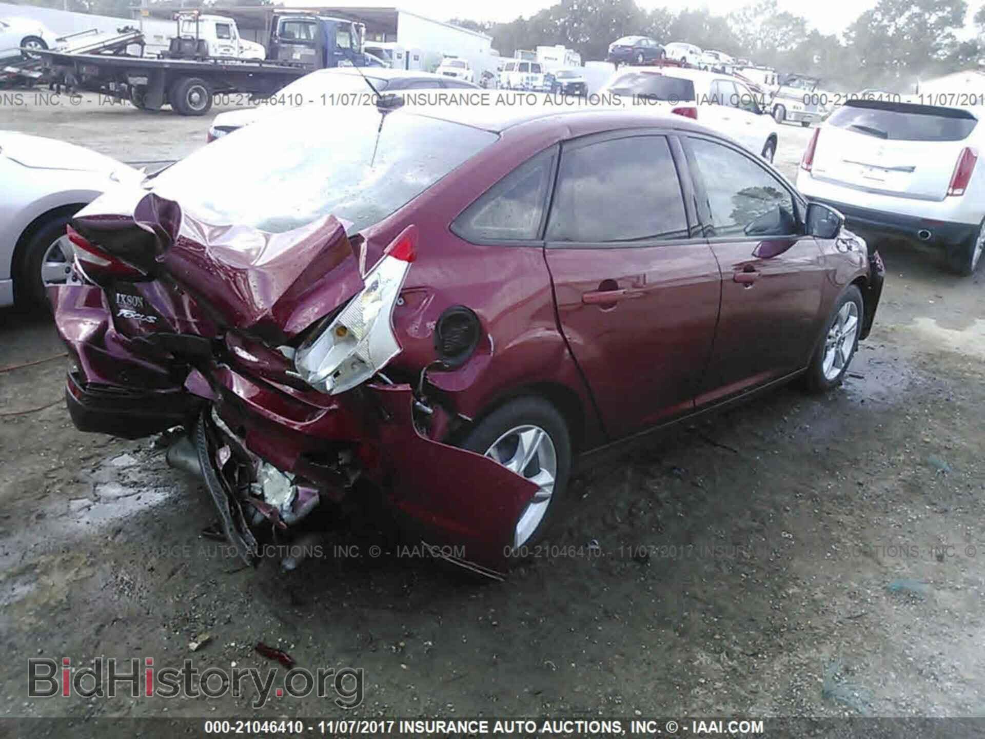 2014 Ford Focus - VIN: 1FADP3F20EL190904 - Photo 4