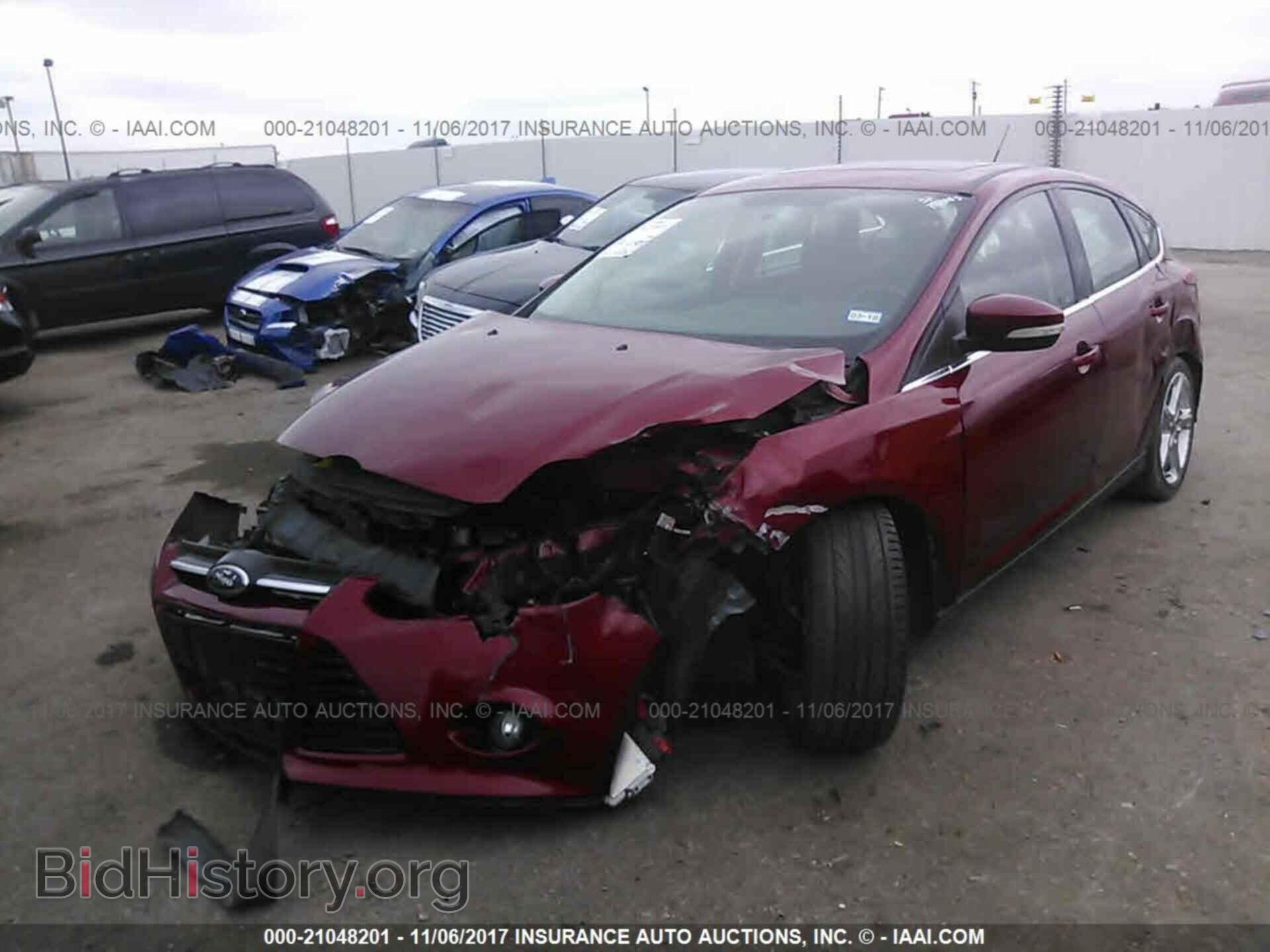 2014 Ford Focus - VIN: 1FADP3N27EL229487 - Фото 2