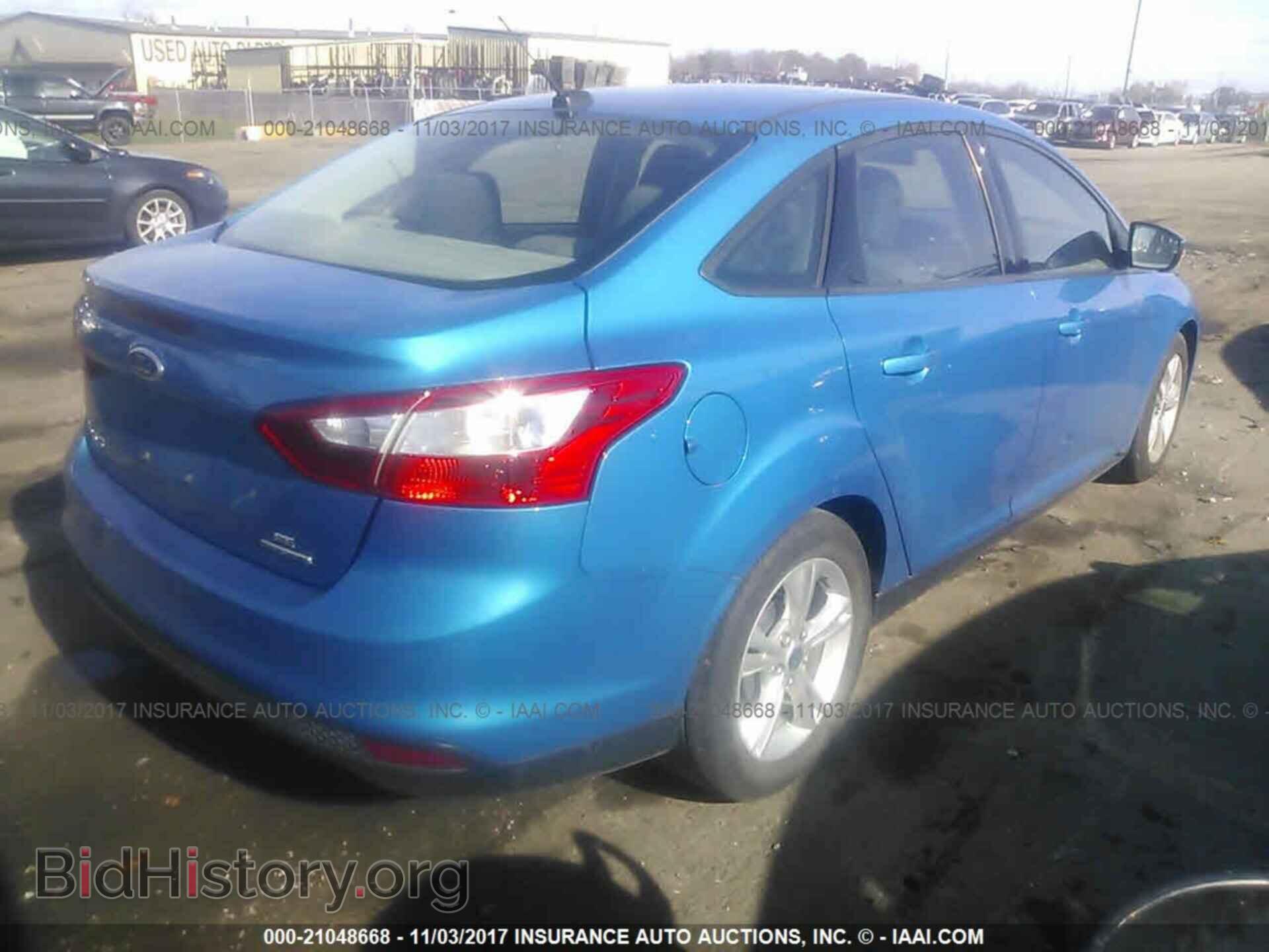2014 Ford Focus - VIN: 1FADP3F28EL194604 - Photo 4