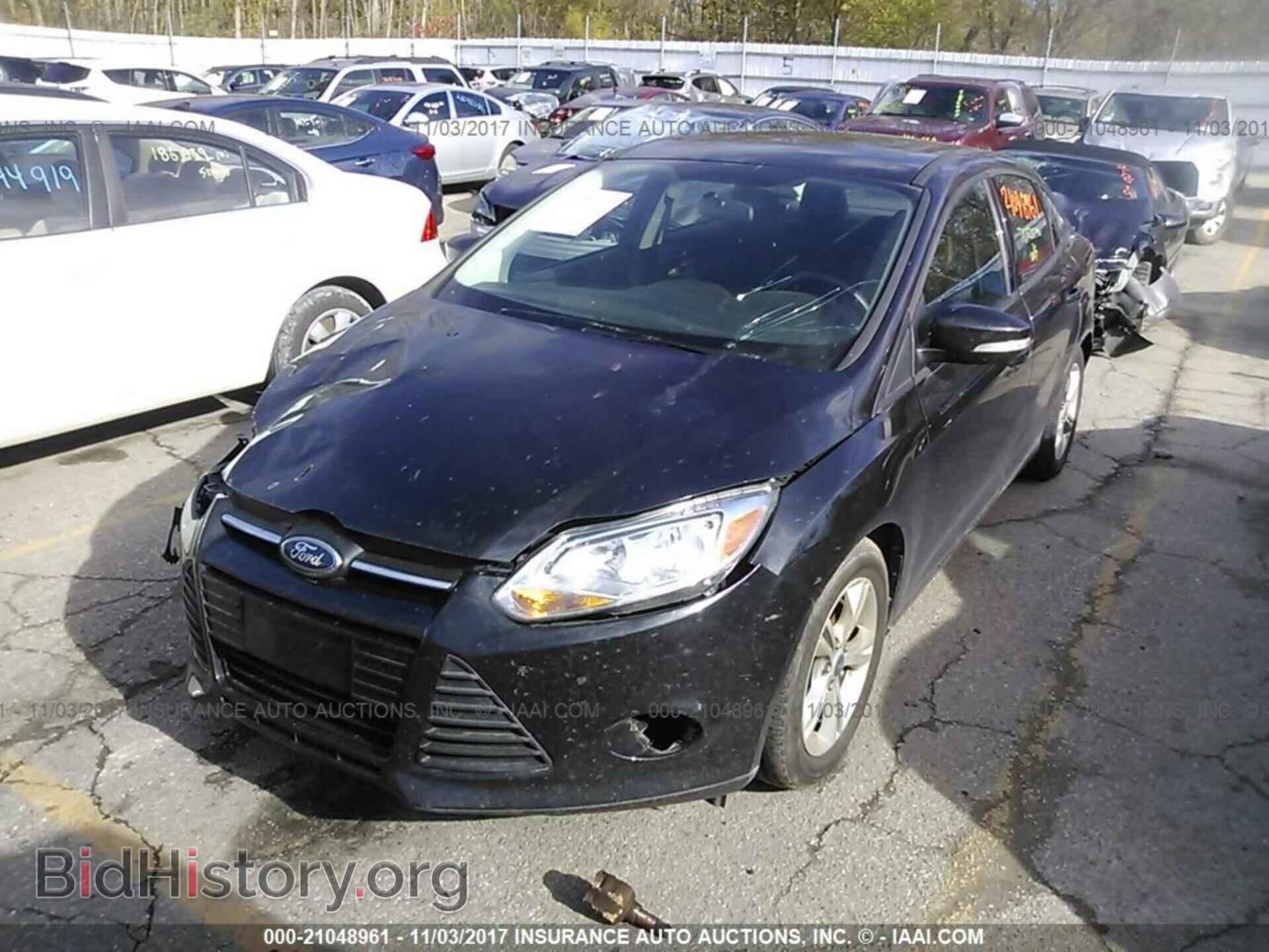 2014 Ford Focus - VIN: 1FADP3F29EL348351 - Photo 2