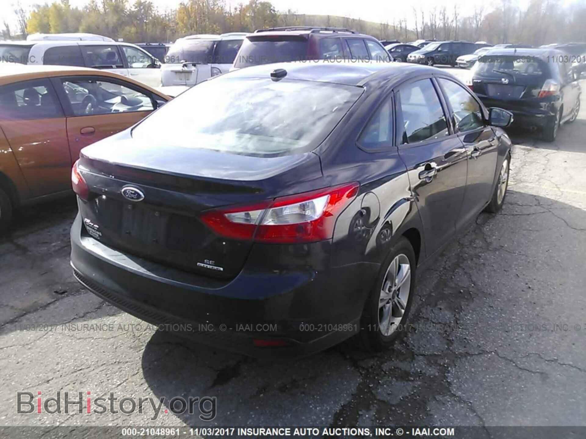 2014 Ford Focus - VIN: 1FADP3F29EL348351 - Photo 4