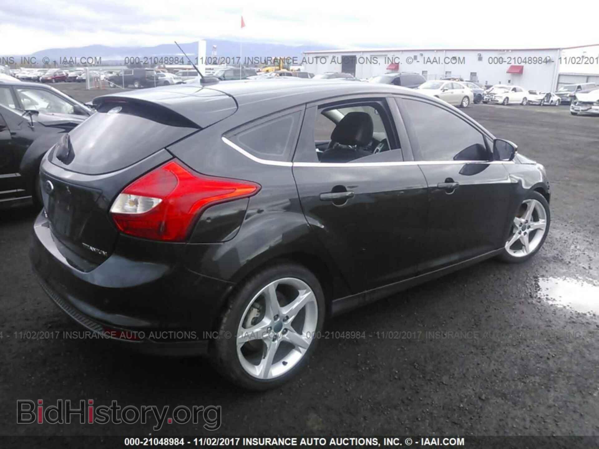 2014 Ford Focus - VIN: 1FADP3N2XEL330345 - Photo 4